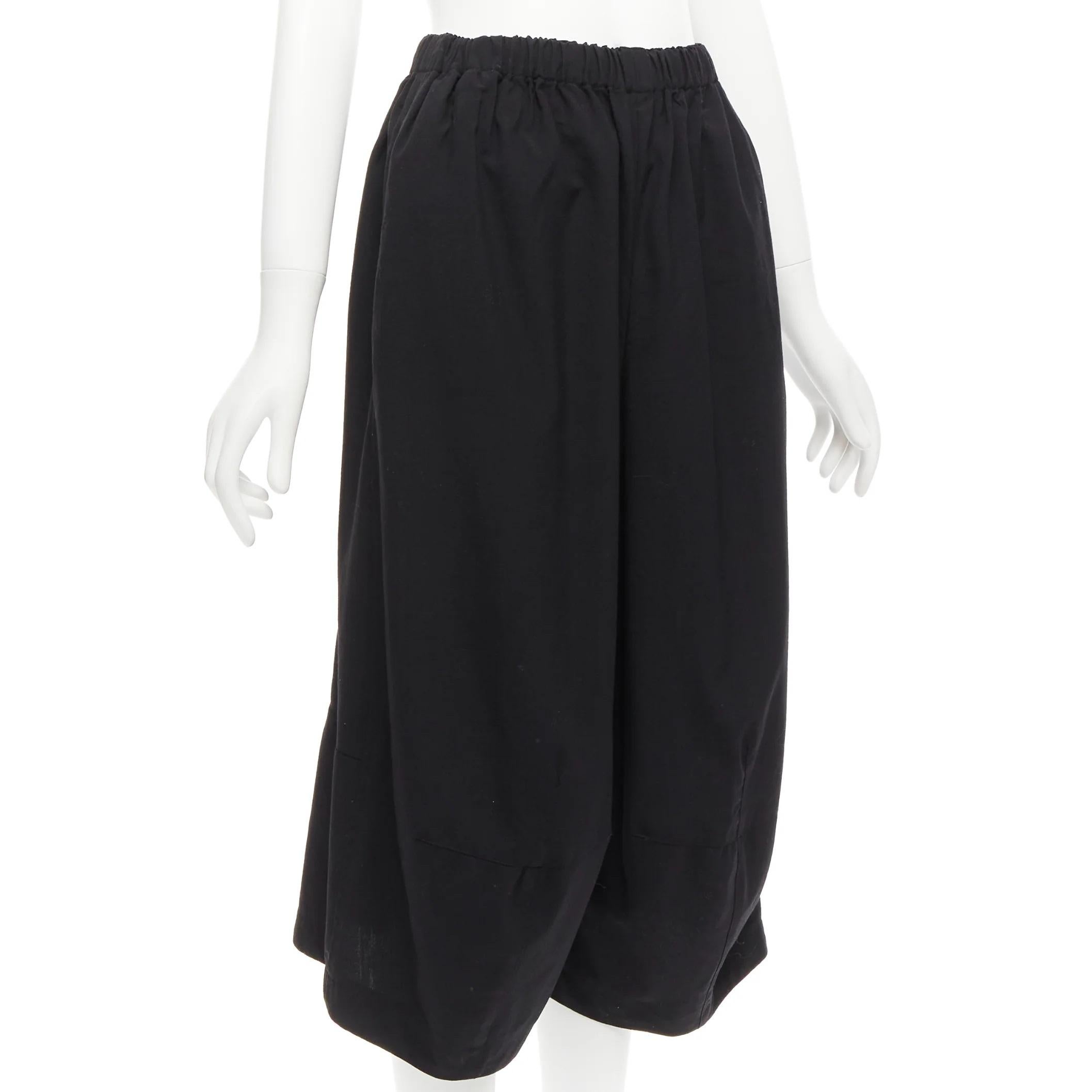 COMME DES GARCONS 2016 CDG black wool panelled wide culotte pants S
Reference: JACG/A00107
Brand: Comme Des Garcons
Collection: CDG
Material: Wool
Color: Black
Pattern: Solid
Closure: Elasticated
Made in: Japan

CONDITION:
Condition: Excellent, this