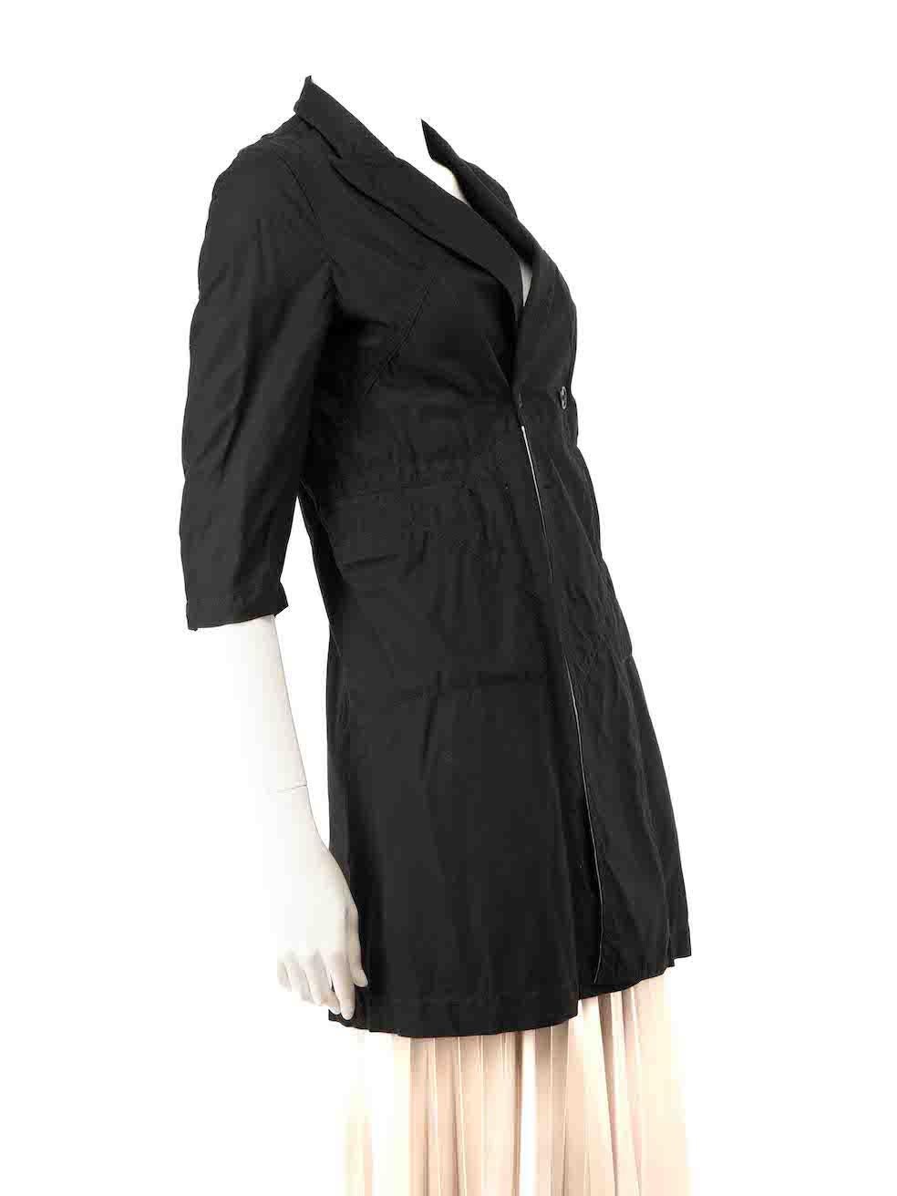 CONDITION is Very good. Minimal wear to coat is evident. The size label is missing and a button missing to the front of the coat on this used Comme Des Garcons designer resale item.
 
 
 
 Details
 
 
 Black
 
 Cotton
 
 Mid length coat
 
 Double
