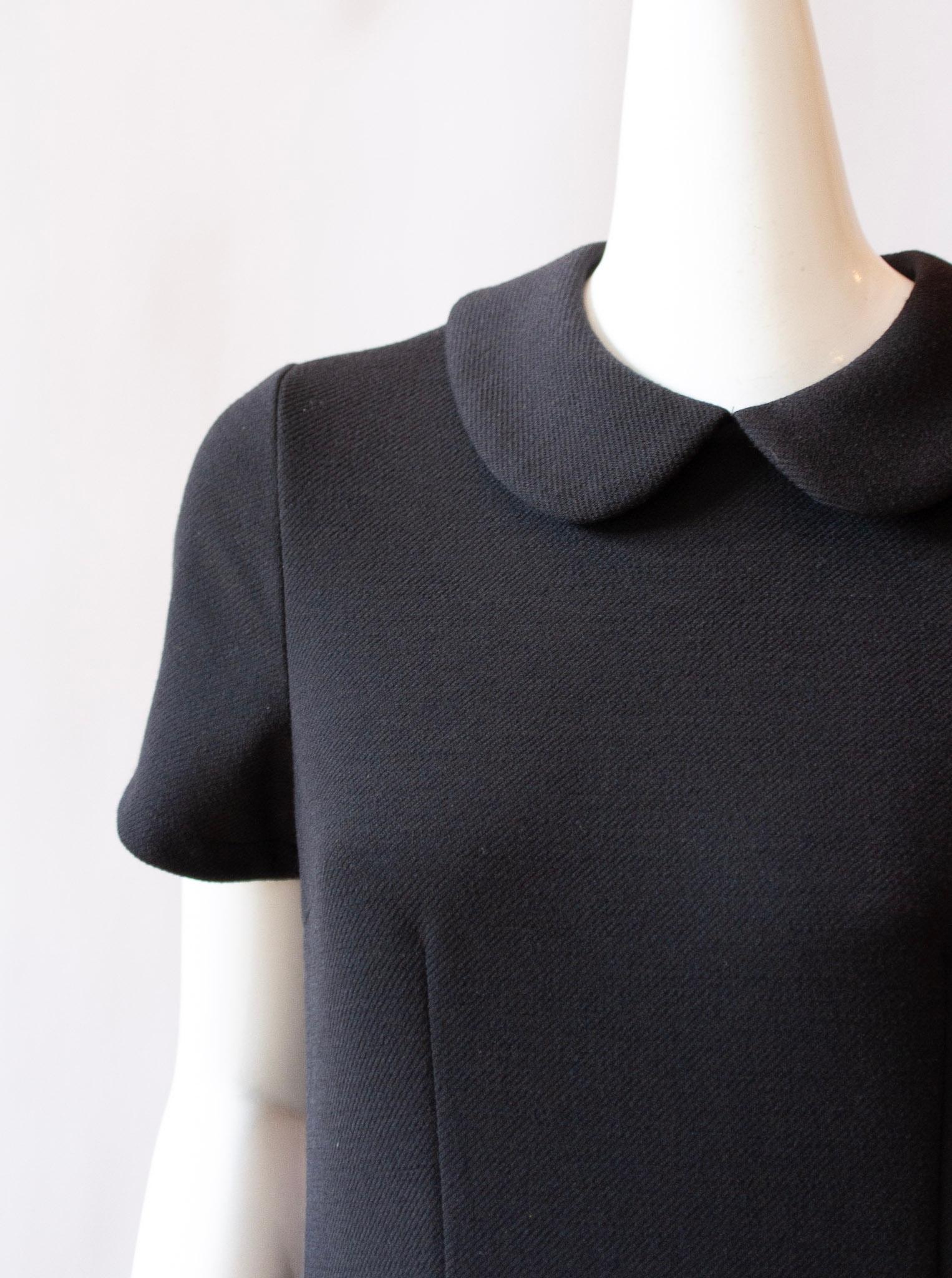 Comme des Garçons black polyester babydoll dress, with pockets 

Size Small 

Back length (top shoulder point to waist): 17.5
