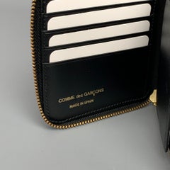 COMME des GARCONS Black Embossed Leather Wallet