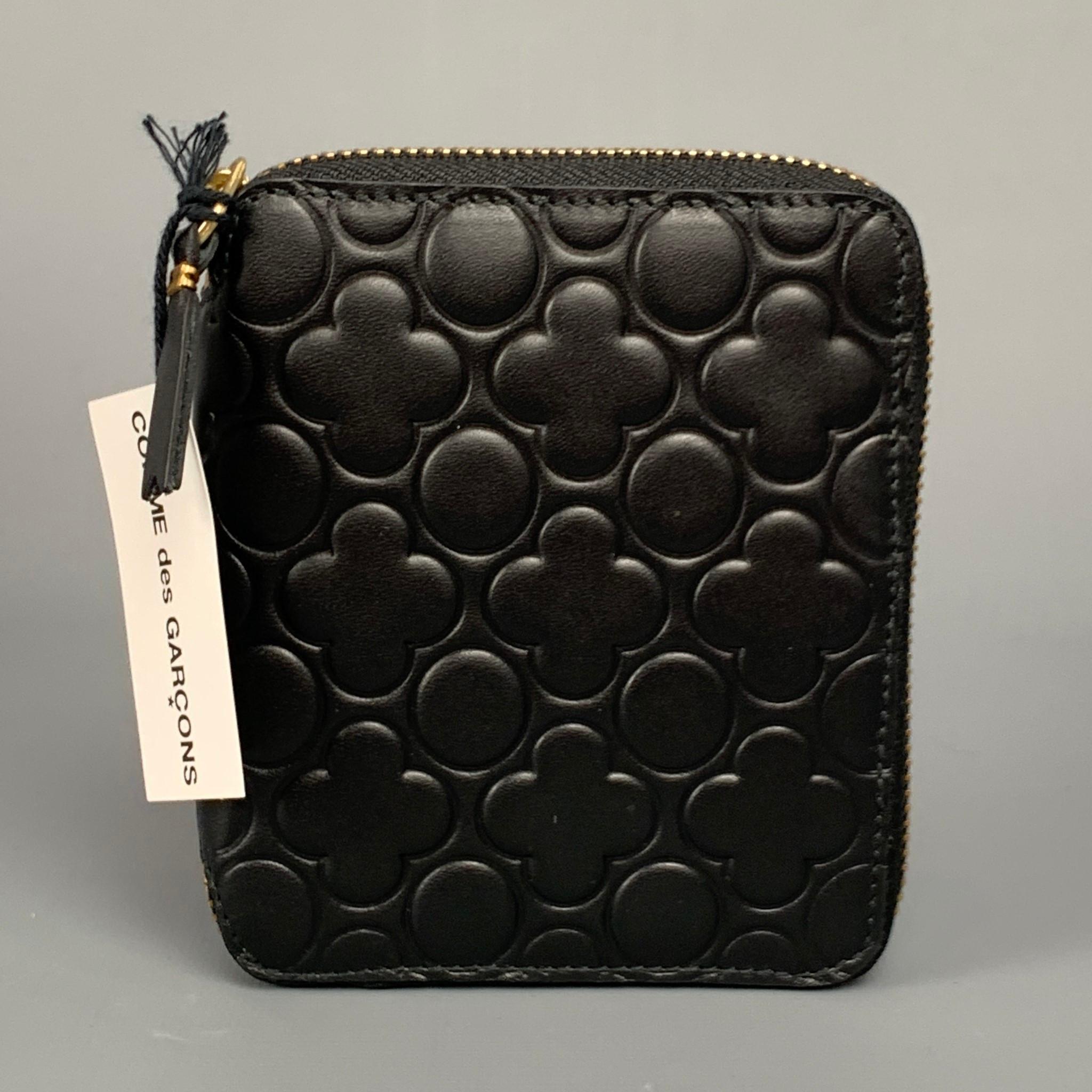 COMME des GARCONS Black Embossed Leather Wallet In New Condition In San Francisco, CA