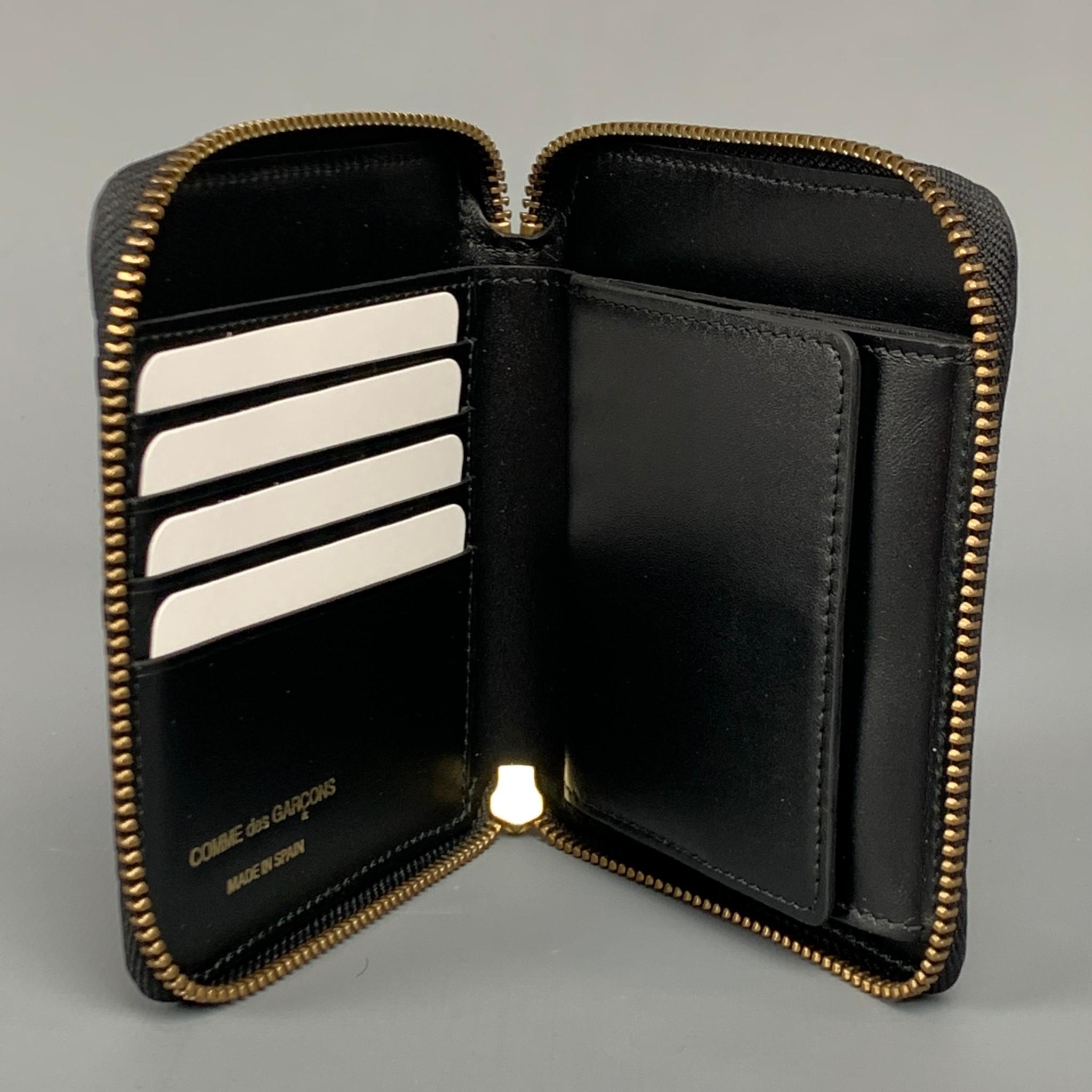 Men's COMME des GARCONS Black Embossed Leather Wallet
