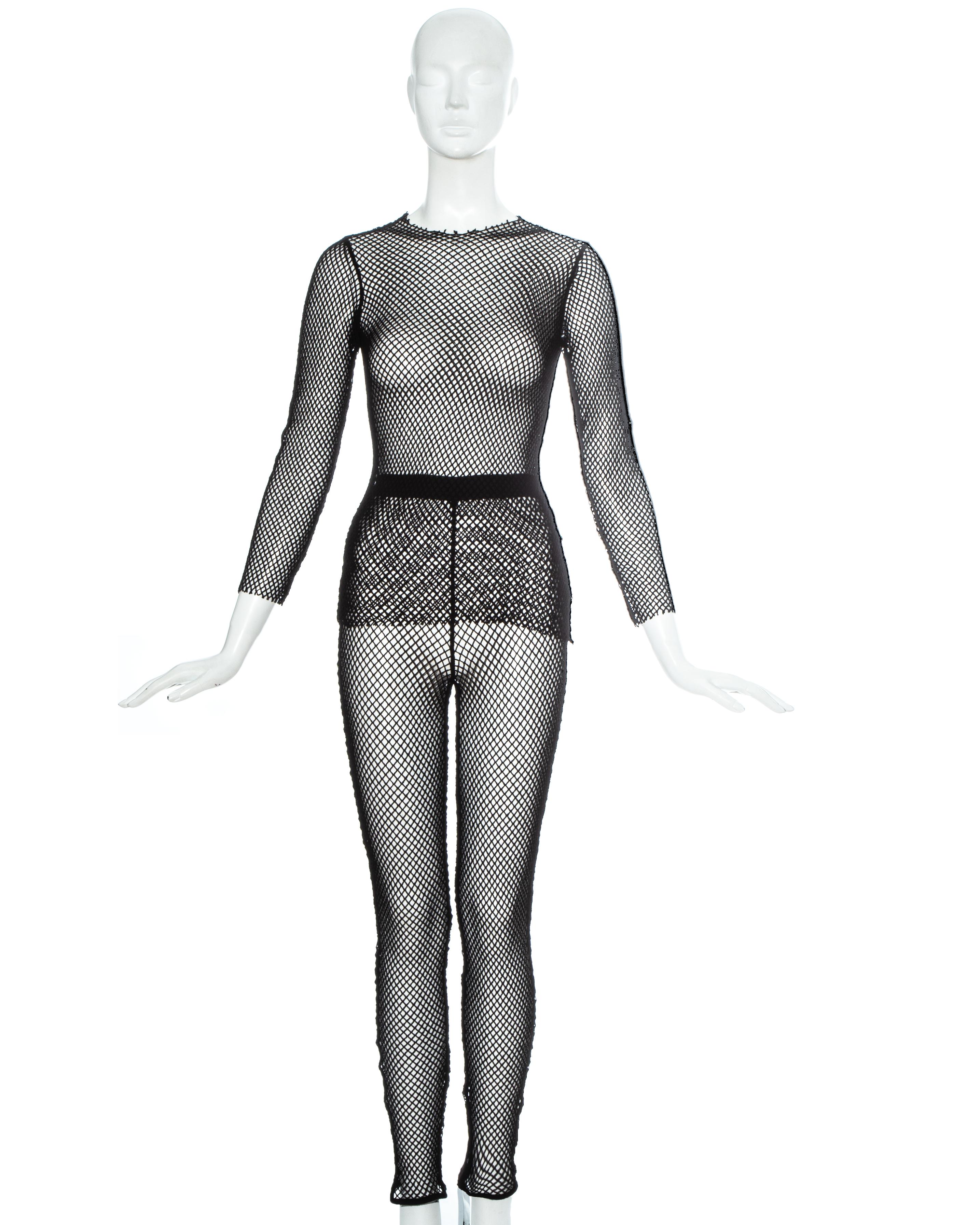 Comme des Garçons black fishnet top and leggings set

Fall-Winter 1991