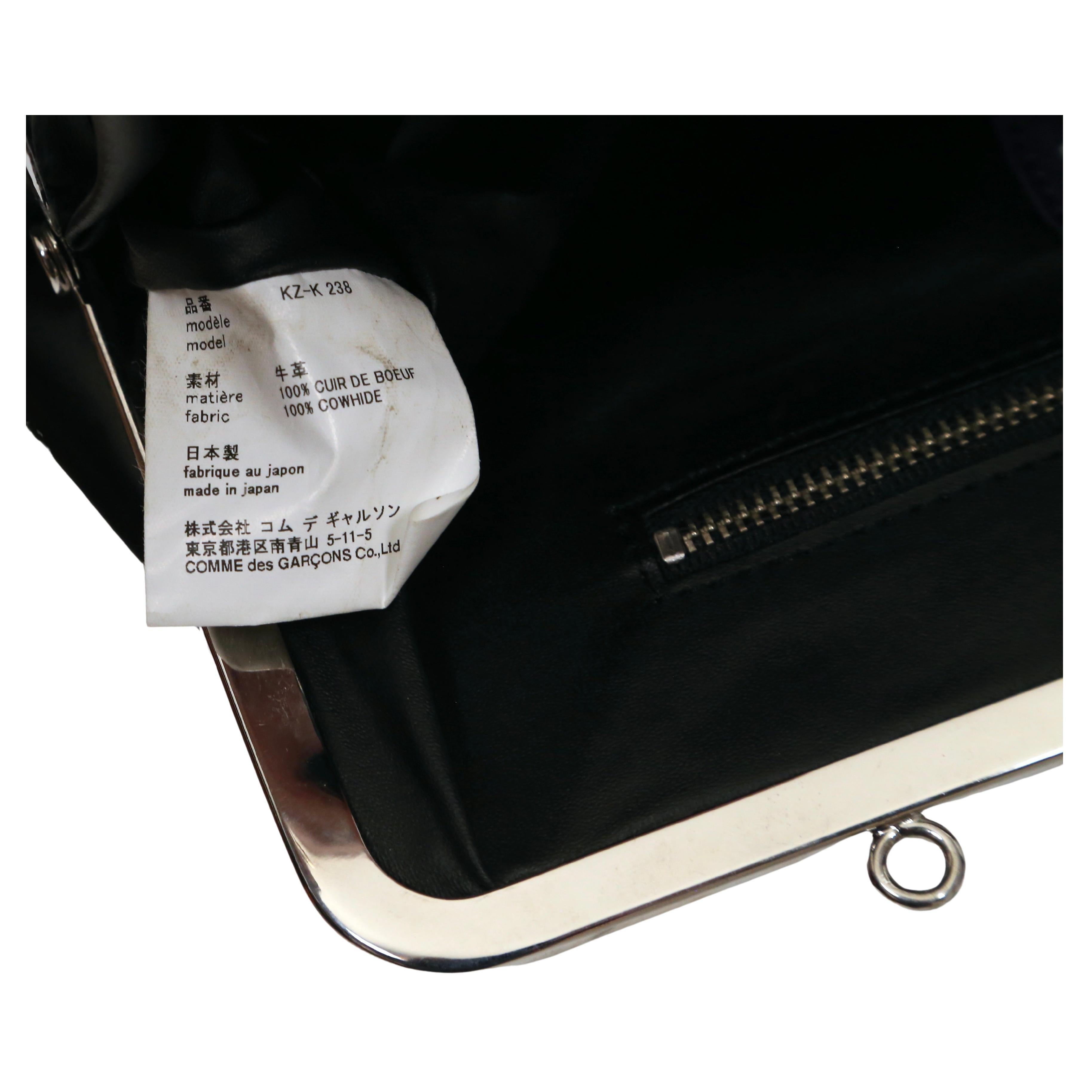 COMME DES GARCONS black leather cross body bag with silver 'kiss lock' frame 1