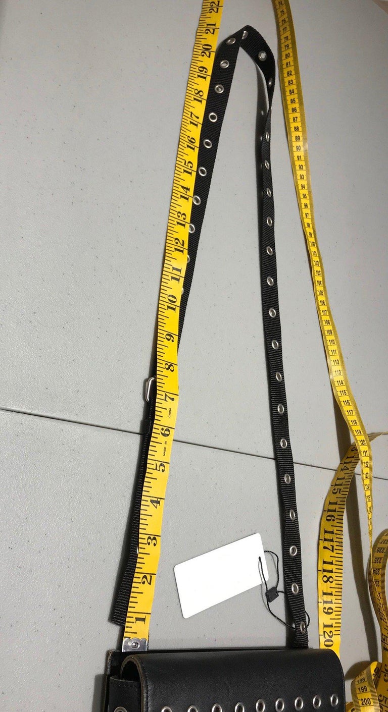 Comme des garçons Black Leather Grommets Purse For Sale at 1stDibs