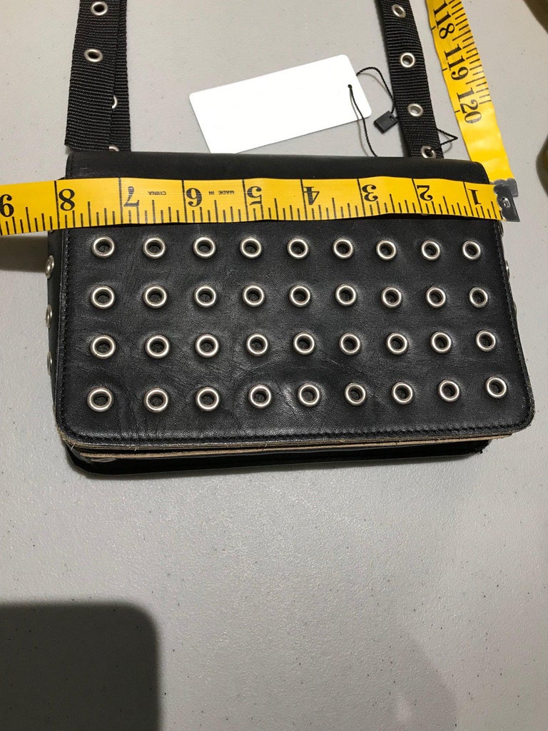 Comme des garçons Black Leather Grommets Purse For Sale at 1stDibs