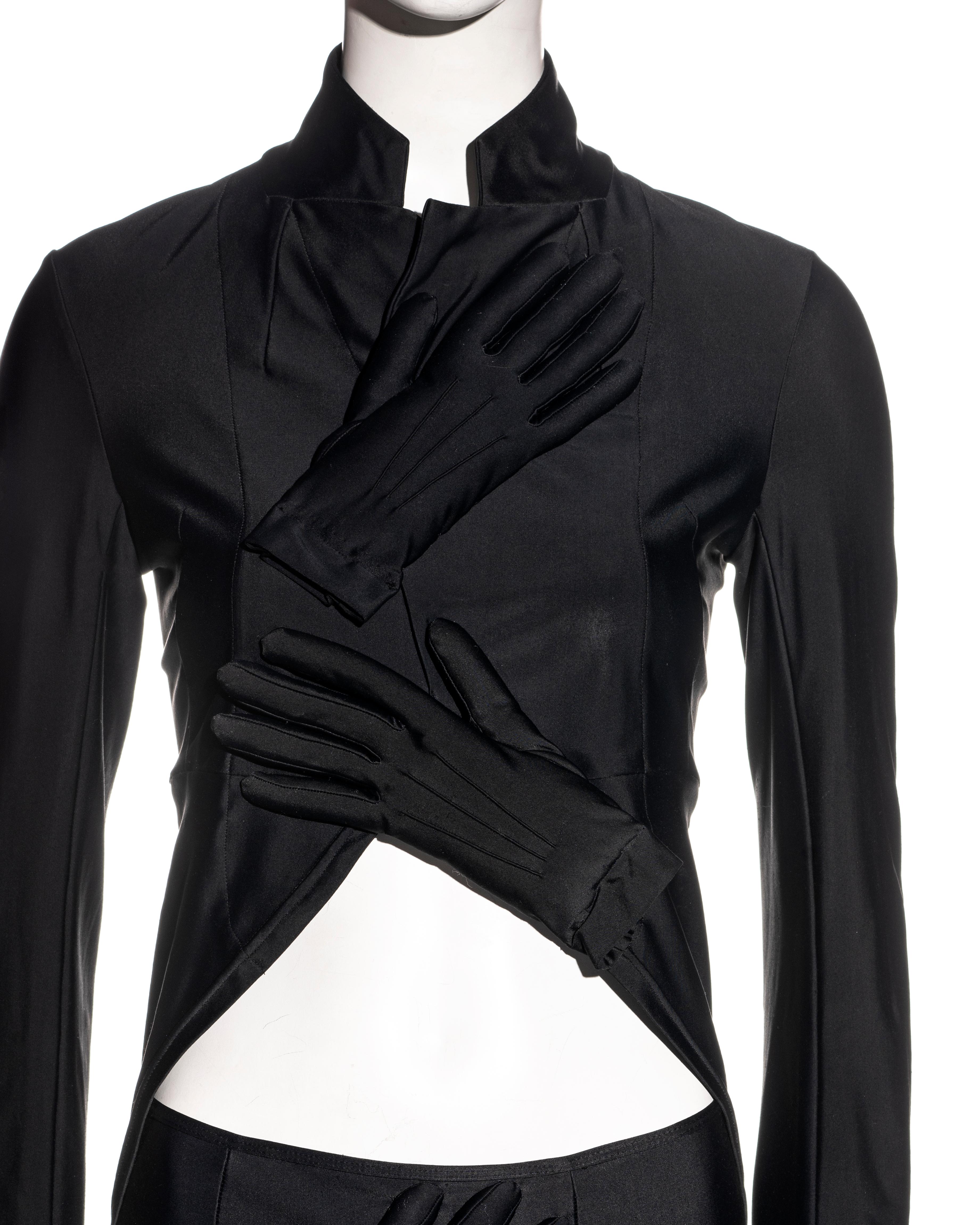 Black Comme des Garçons black lycra jacket and pants with padded hand motifs, fw 2007
