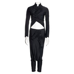 Comme des Garçons black lycra jacket and pants with padded hand motifs, fw 2007