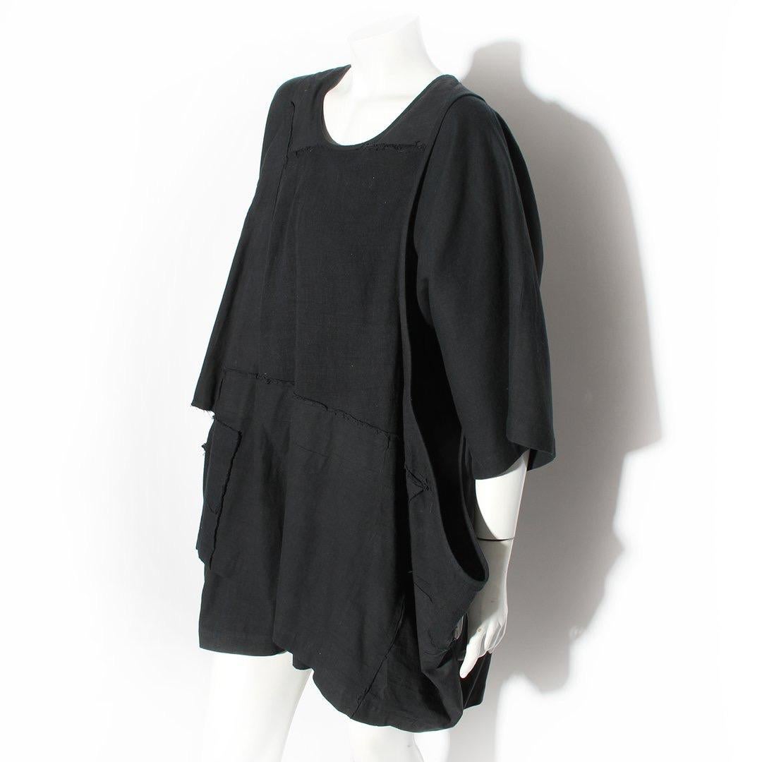 A Comme des Garćons Dress
Made in Japan 
Black 
100% Cotton 
