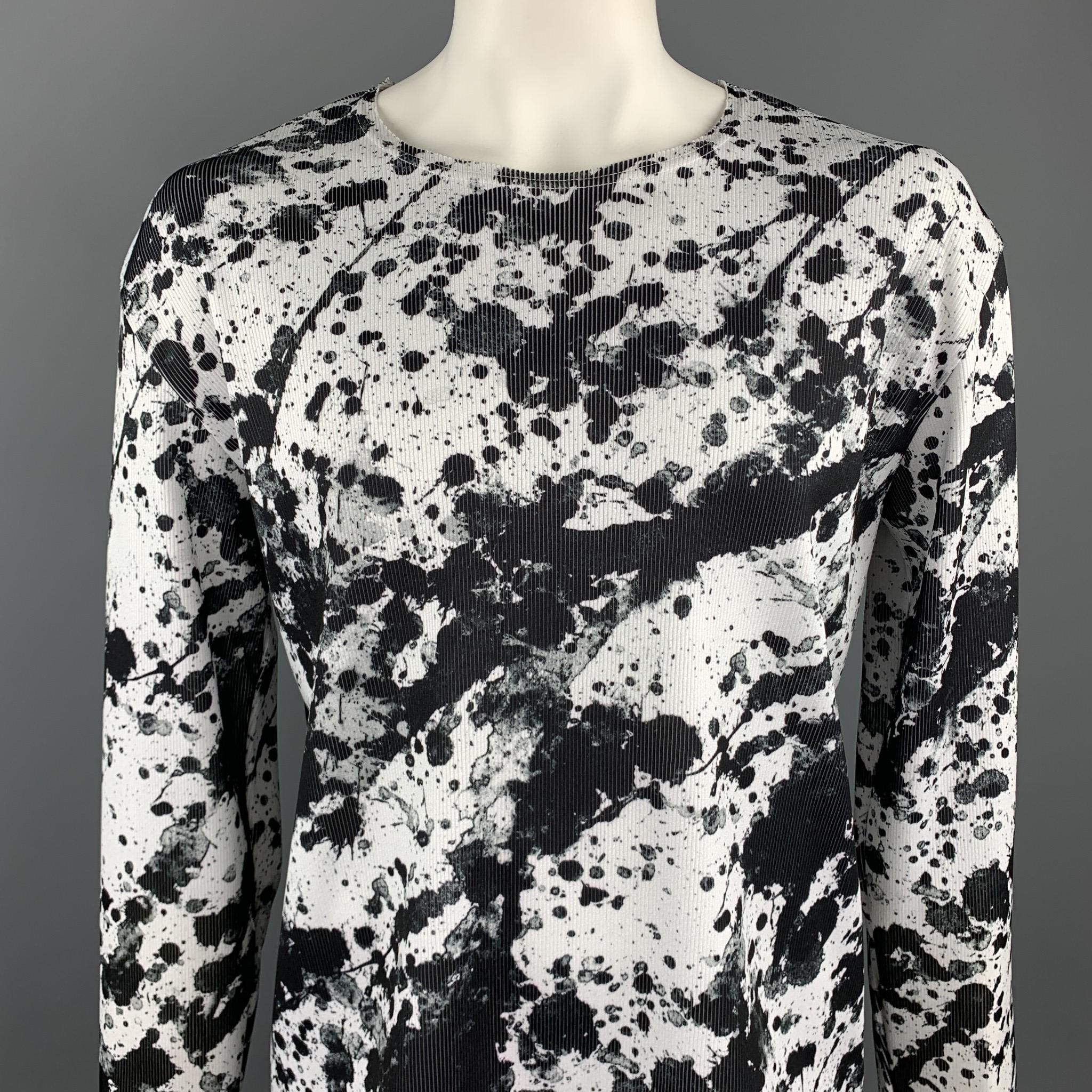 COMME des GARCONS BLACK pullover comes in a black & white ribbed polyester with a splattered print all over featuring round neck. Made in Japan. 

New With Tags. 
Marked: XXL / AD2018

Measurements:

Shoulder: 22.5 in. 
Chest: 47 in. 
Sleeve: 27 in.