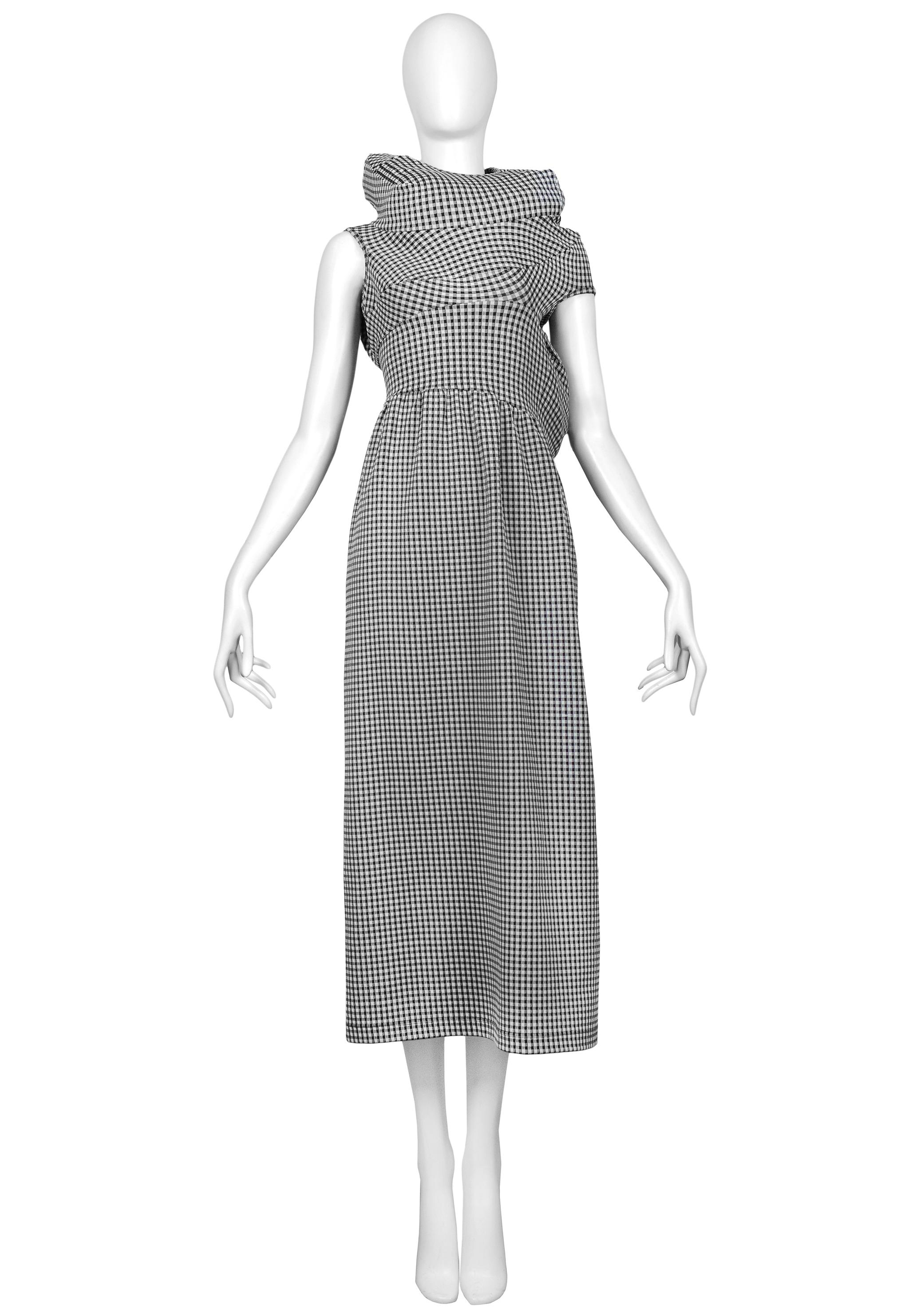 Resurrection Vintage is excited to offer a vintage Comme des Garcons rare and iconic black and white check 