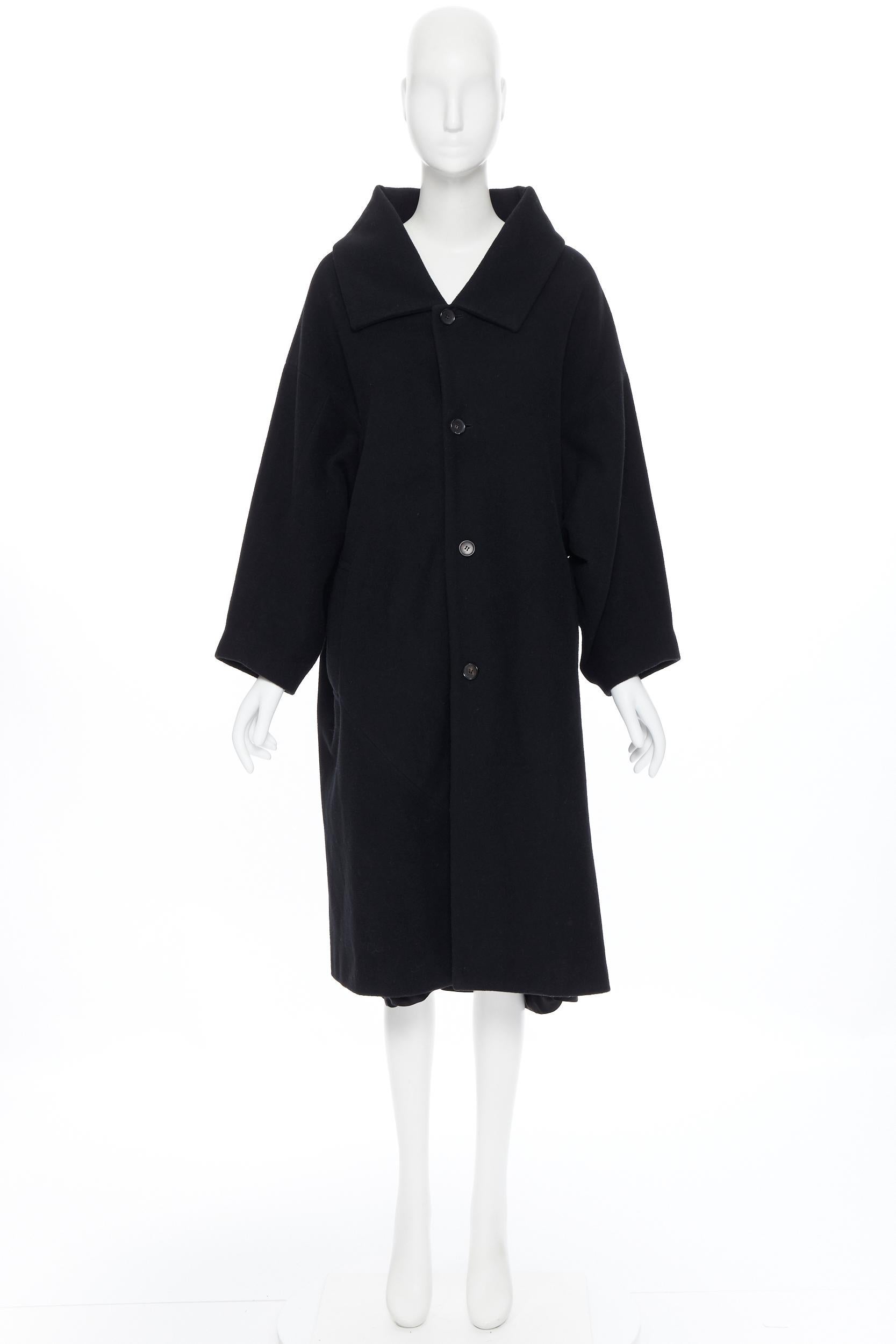 COMME DES GARCONS black wool blend kimono sleeve exposed lining winter coat S
Brand: Comme Des Garcons
Designer: Rei Kawakubo
Model Name / Style: Wool coat
Material: Wool blend
Color: Black
Pattern: Solid
Closure: Button
Extra Detail: Oversized cut.
