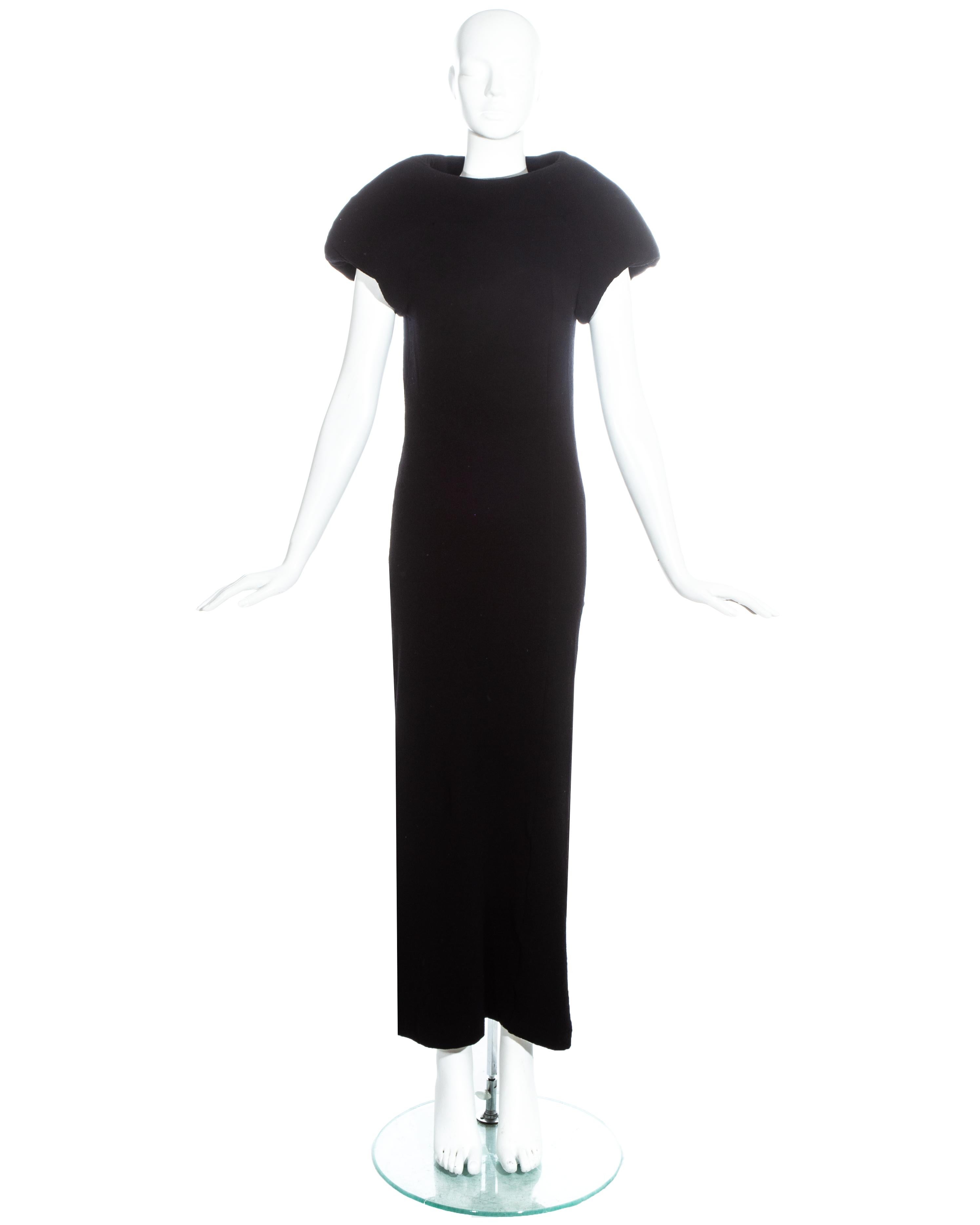 Comme des Garcons black wool and nylon blend maxi dress with polyester padding around the shoulders -  a signature look of the 'Body Meets Dress / Dress Meets Body' collection.

Spring-Summer 1997