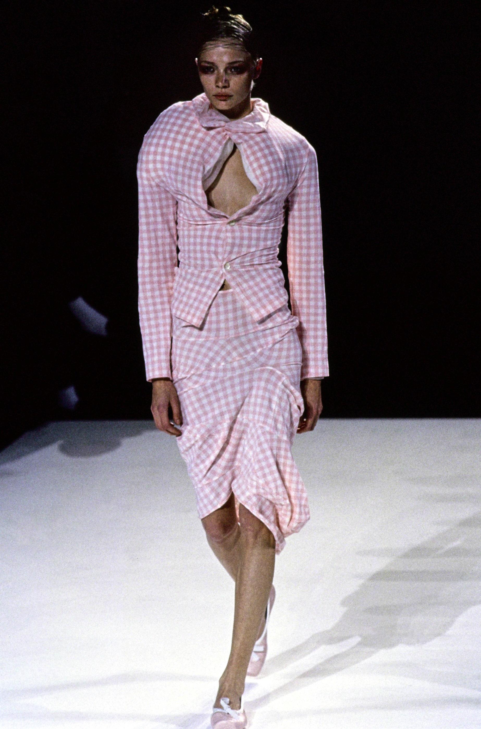 Comme des Garçons 'Body Meets Dress, Dress Meets Body' / 'Lumps and Bumps' stretch nylon gingham runway ensemble comprising: pink jacket with tulle lining, internal pillows, button closures; blue skirt with irregular, undulating seams with dripping