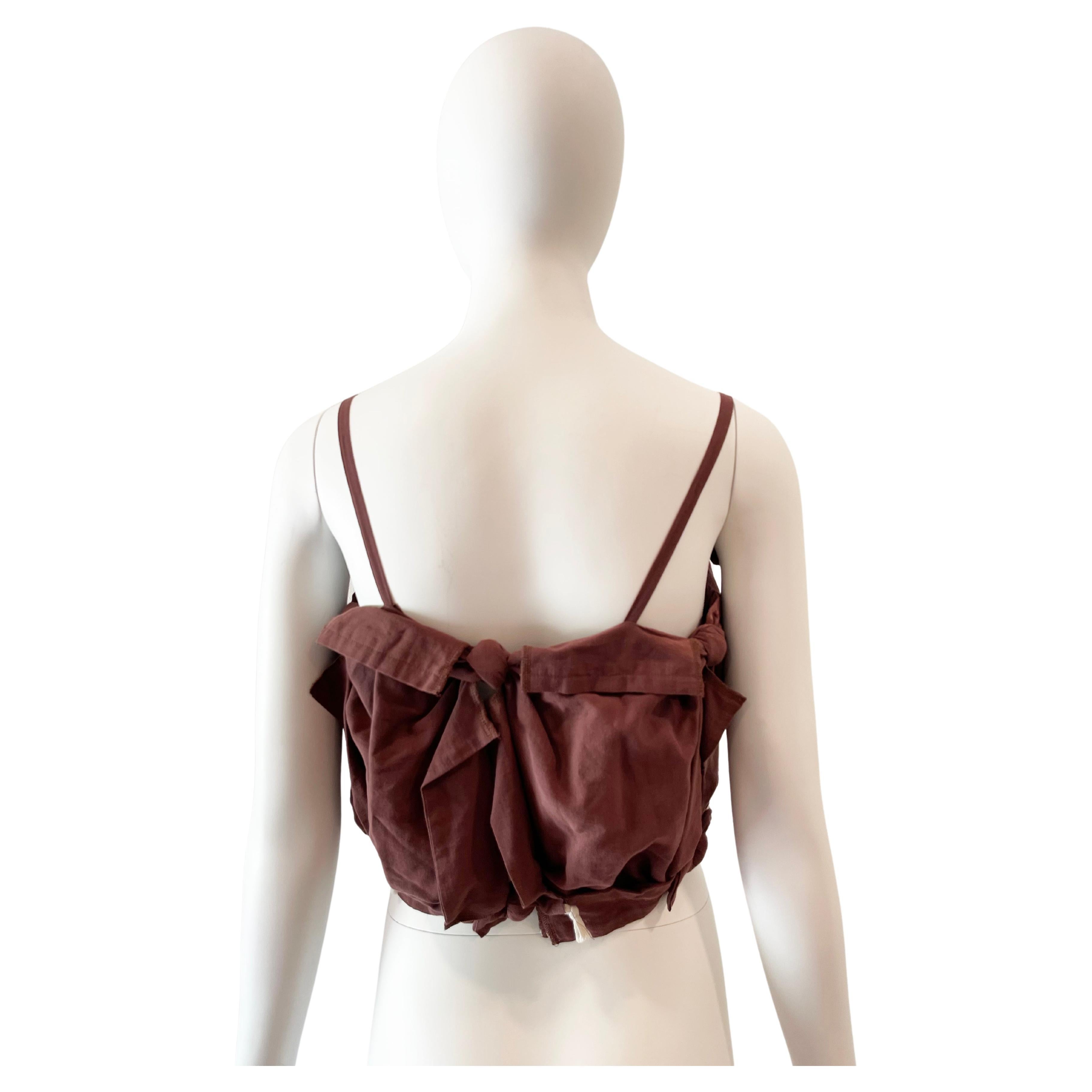 Comme des Garcons brown knot cropped top. 

Condition: Very good

34