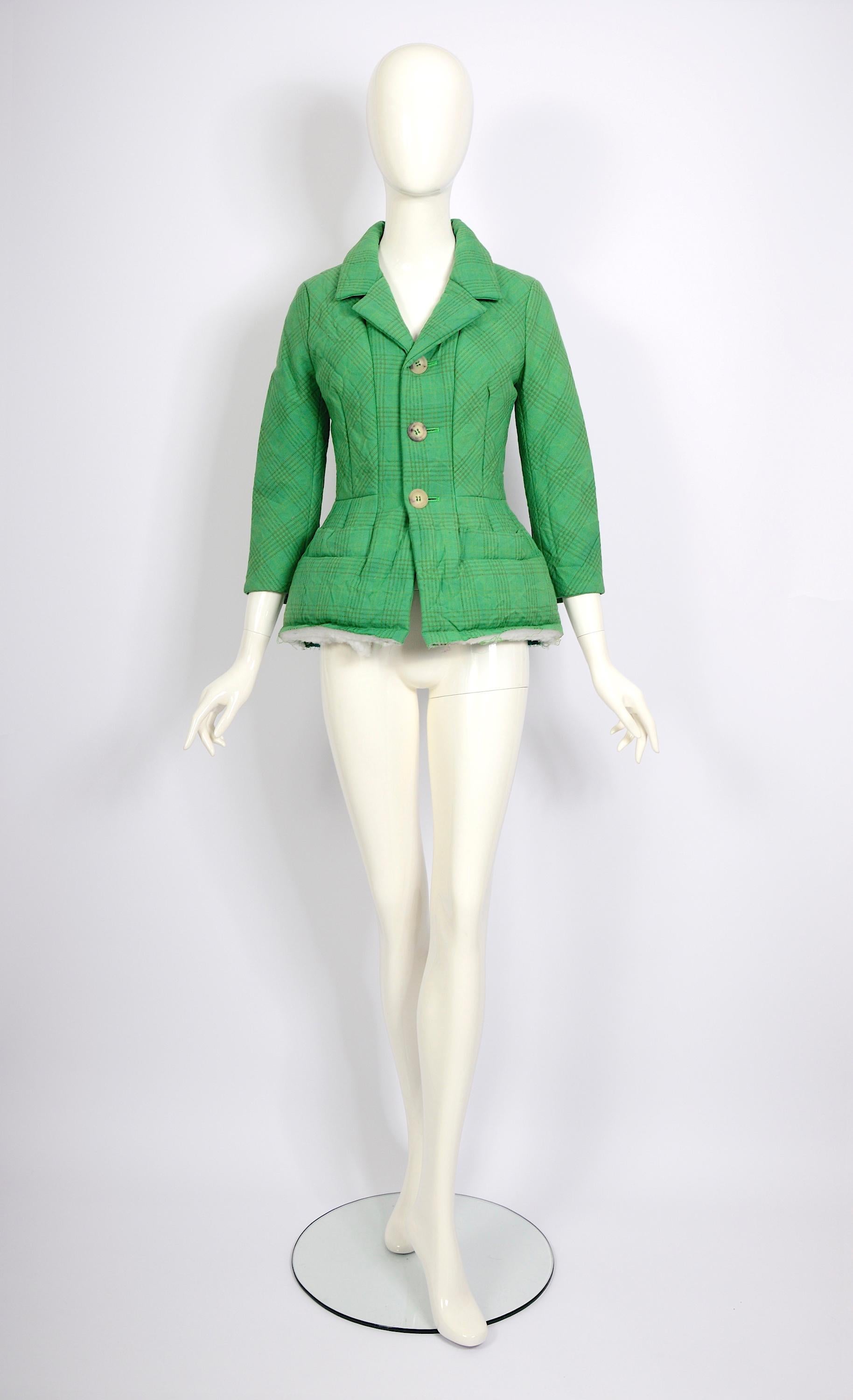 Junya Watanabe Comme des Garcons green wool jacket with a deconstructed hem.
2004 collection
Size S made in Japan
Measurements taken flat:
Ua to Ua 18inch/46cm(x2) - Waist 15inch/38cm(x2) - Sleeve 20inch/51cm - Total Length 26inch/66cm