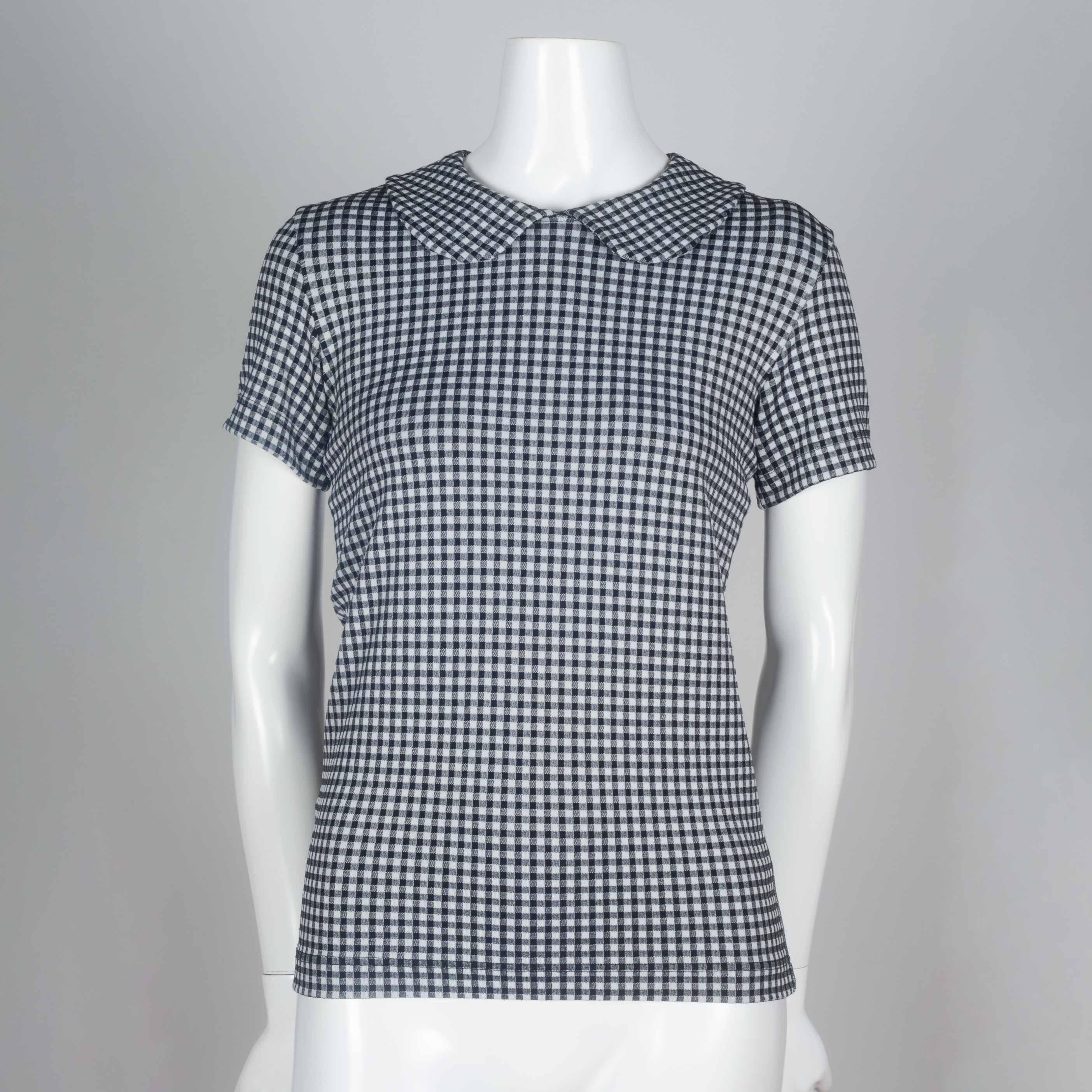 Comme des Garçons Robe de Chambre 1996 collared tee in black and white checkered fabric. 

YEAR: 1996
MARKED SIZE: No marked size
US WOMEN'S: XS
US MEN'S: XXS
FIT: Regular
CHEST: 14