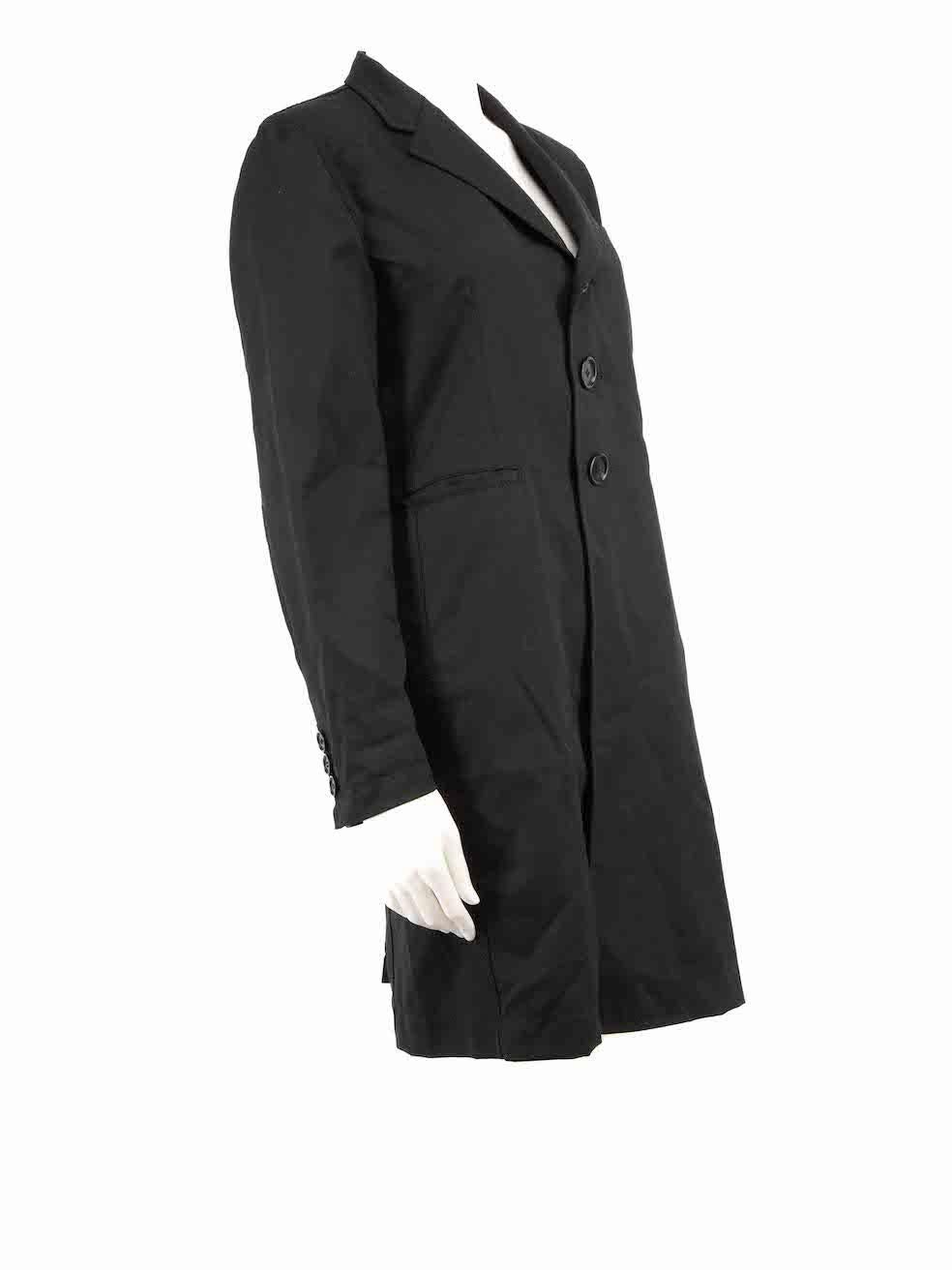 CONDITION is Very good. Hardly any visible wear to coat is evident on this used Comme Des Garcons BLACK designer resale item.
 
 Details
 Black
 Wool
 Coat
 Button up fastening
 Buttoned cuffs
 3x Front pockets
 
 
 Made in Japan
 
 Composition
