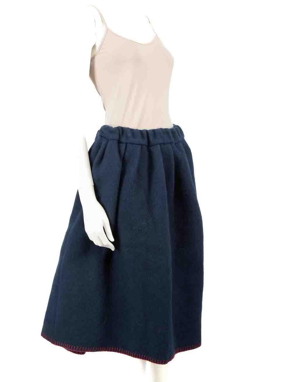 CONDITION is Never worn, with tags. No visible wear to the skirt is evident on this new Comme Des Garcons Girl designer resale item.
 
 
 
 Details
 
 
 Navy
 
 Wool
 
 Full skirt
 
 Midi length
 
 Elasticated waistband
 
 2x Front side pockets
 
