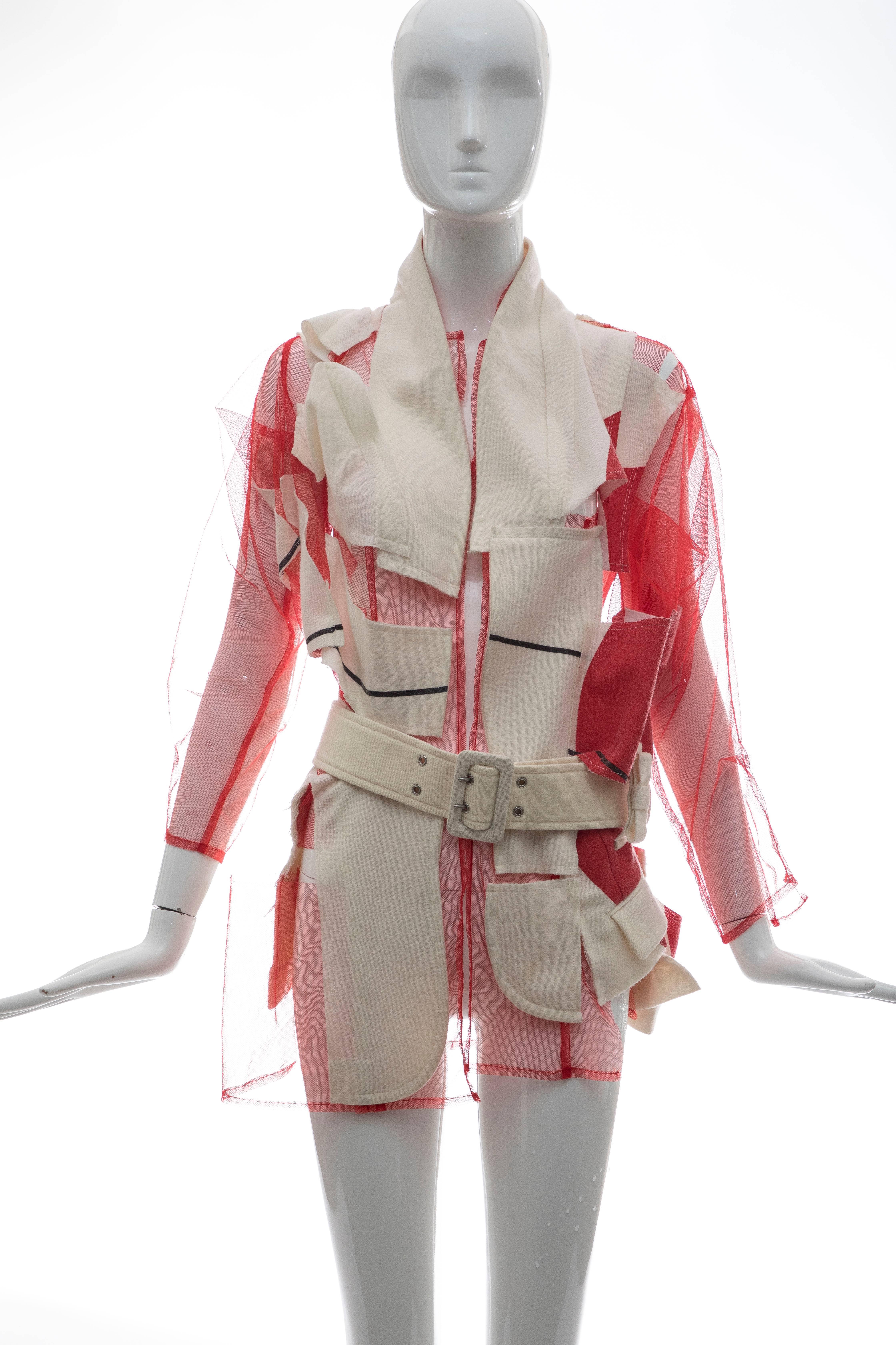 Comme des garcons Spring 2007 deconstructed red mesh jacket with cream wool patchwork throughout and cream wool belt at waist.

Bust: 40, Waist 32, Shoulder 15, Length 30, Sleeve 26
