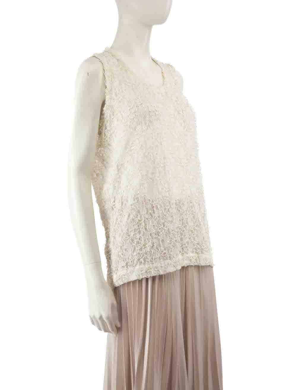 Condition
 
 CONDITION is Very good. Hardly any visible wear to top is evident on this used Comme des Gar√ßons designer resale item.
 
 Details
 
 
 
 Ecru
 
 Lace
 
 Top
 
 Sleeveless
 
 Metallic embroidery
 
 Round neck
 
 Sheer
 
 
 
 
 
 Size: