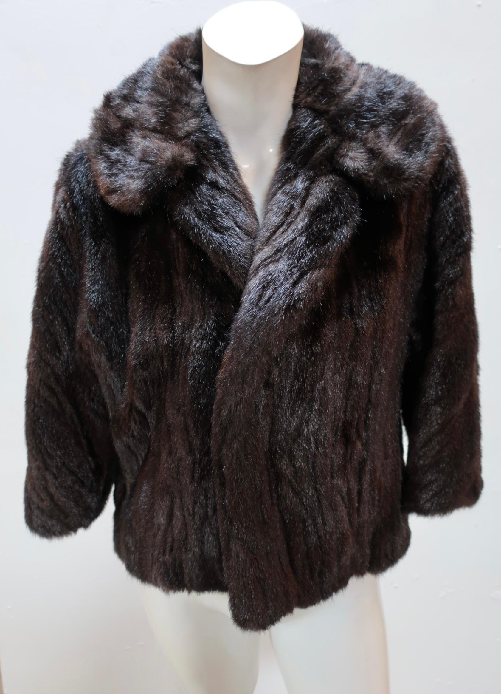 This cozy faux mink Jacket comes to you from vintage Comme Des Garçons. Fall to just below waist and has a hook and eye closure. 