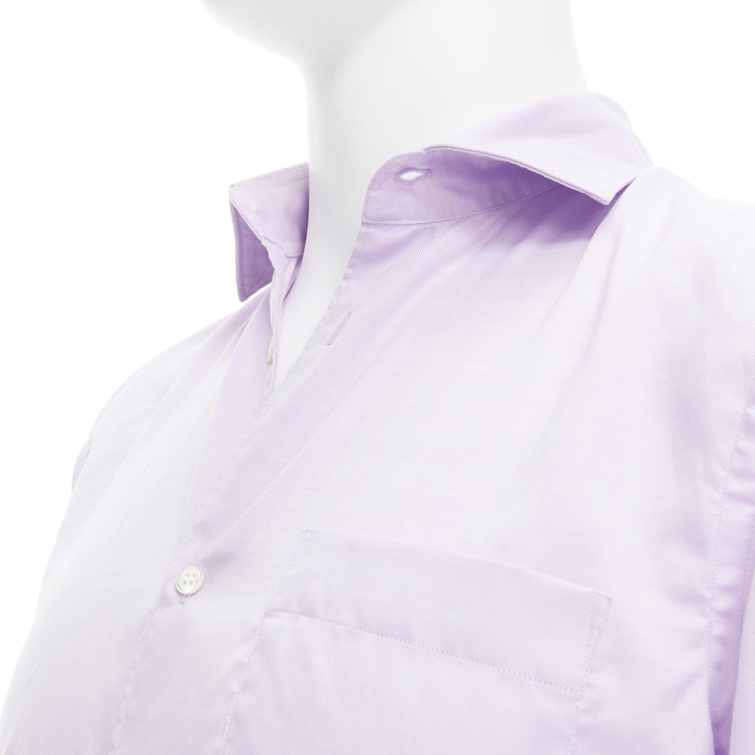COMME DES GARCONS Homme Deux light purple cotton shirt S 
Reference: JNWG/A00029 
Brand: Comme des Garcons Homme Deux 
Material: Cotton 
Color: Purple 
Pattern: Solid 
Closure: Button 
Estimated Retail Price: US $540 
Made in: Japan 

CONDITION: