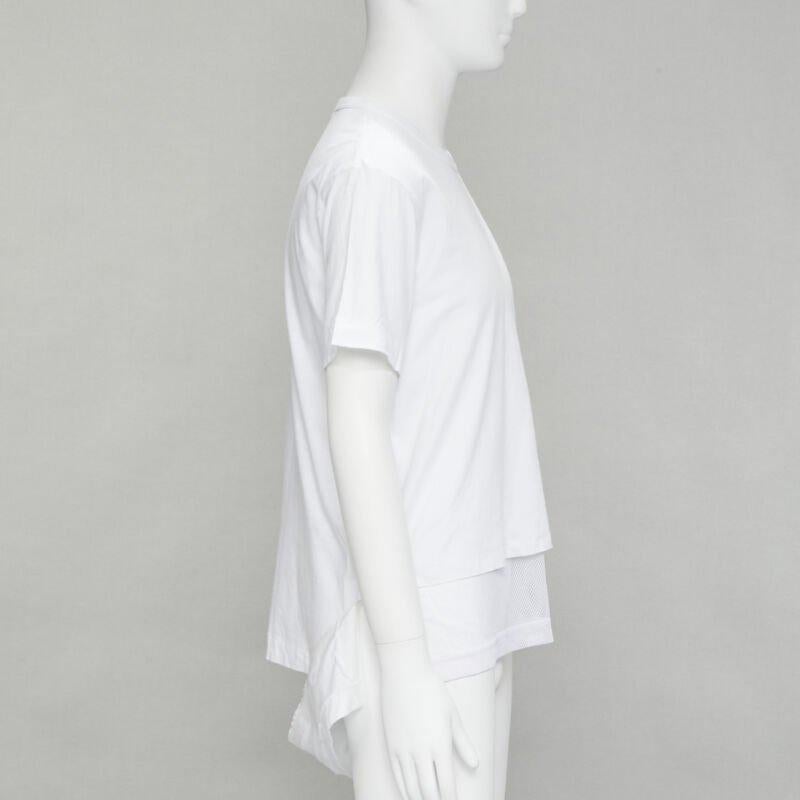 COMME DES GARCONS HOMME PLUS 2015 white deconstructed fishnet hem tshirt M
Reference: EDTG/A00073
Brand: Comme Des Garcons
Designer: Rei Kawakubo
Collection: 2015
Material: Cotton
Color: White
Pattern: Solid
Extra Details: Deconstructed cut front