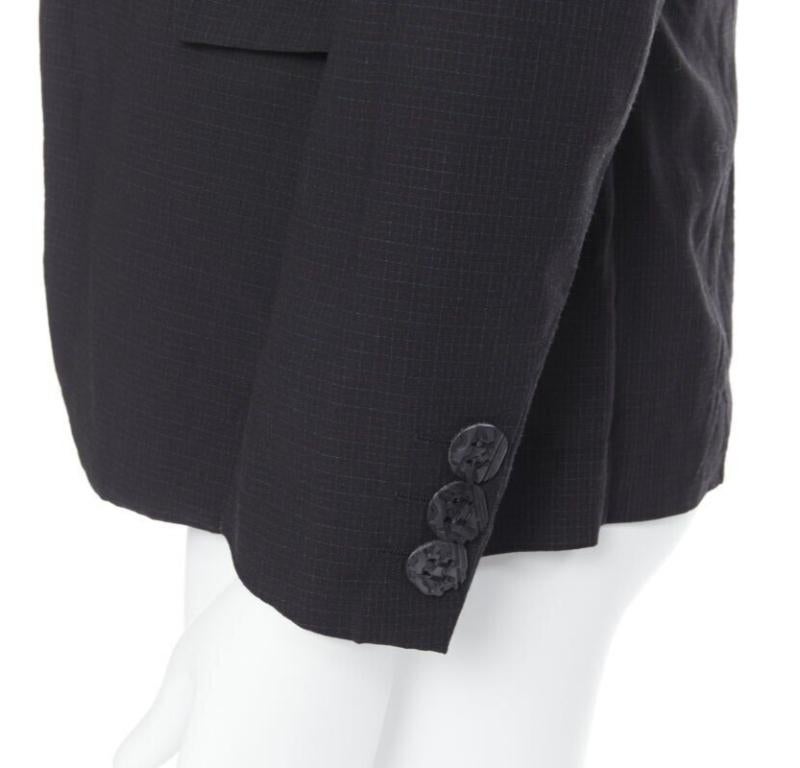 COMME DES GARCONS HOMME PLUS black check rubber buttons blazer jacket XS
Reference: PRCN/A00057
Brand: Comme Des Garcons
Designer: Rei Kawakubo
Model: Wool blend blazer
Collection: 2012
Material: Wool, Polyester
Color: Black
Pattern: