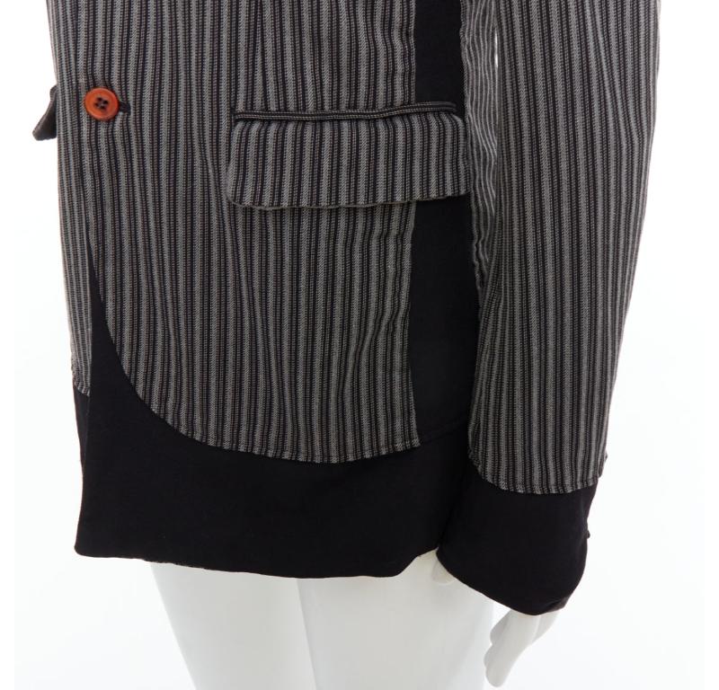 COMME DES GARCONS HOMME PLUS Evergreen grey black striped layered blazer M
Reference: PRWU/A00035
Brand: Comme Des Garcons
Collection: HOMME PLUS Evergreen
Material: Feels like wool
Color: Grey, Black
Pattern: Striped
Closure: Button
Lining: Grey