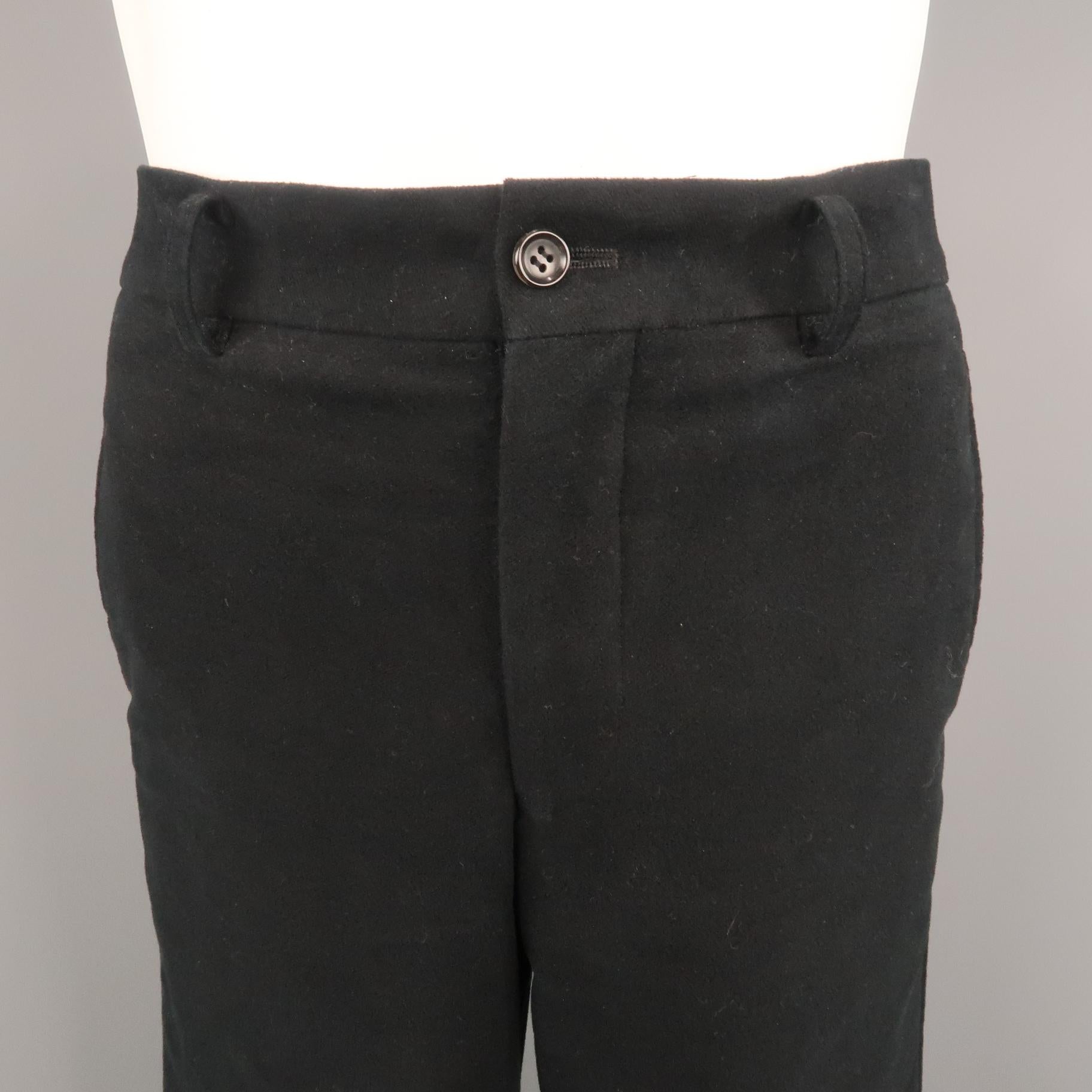 COMME des GARCONS HOMME PLUS casual pant comes in a black moleskin featuring knee stitch details. AD2017. Made in Japan.
 
Excellent Pre-Owned Condition.
Marked: L
 
Measurements:
 
Waist: 32 in.
Rise: 8.5 in.
Inseam: 34 in.
