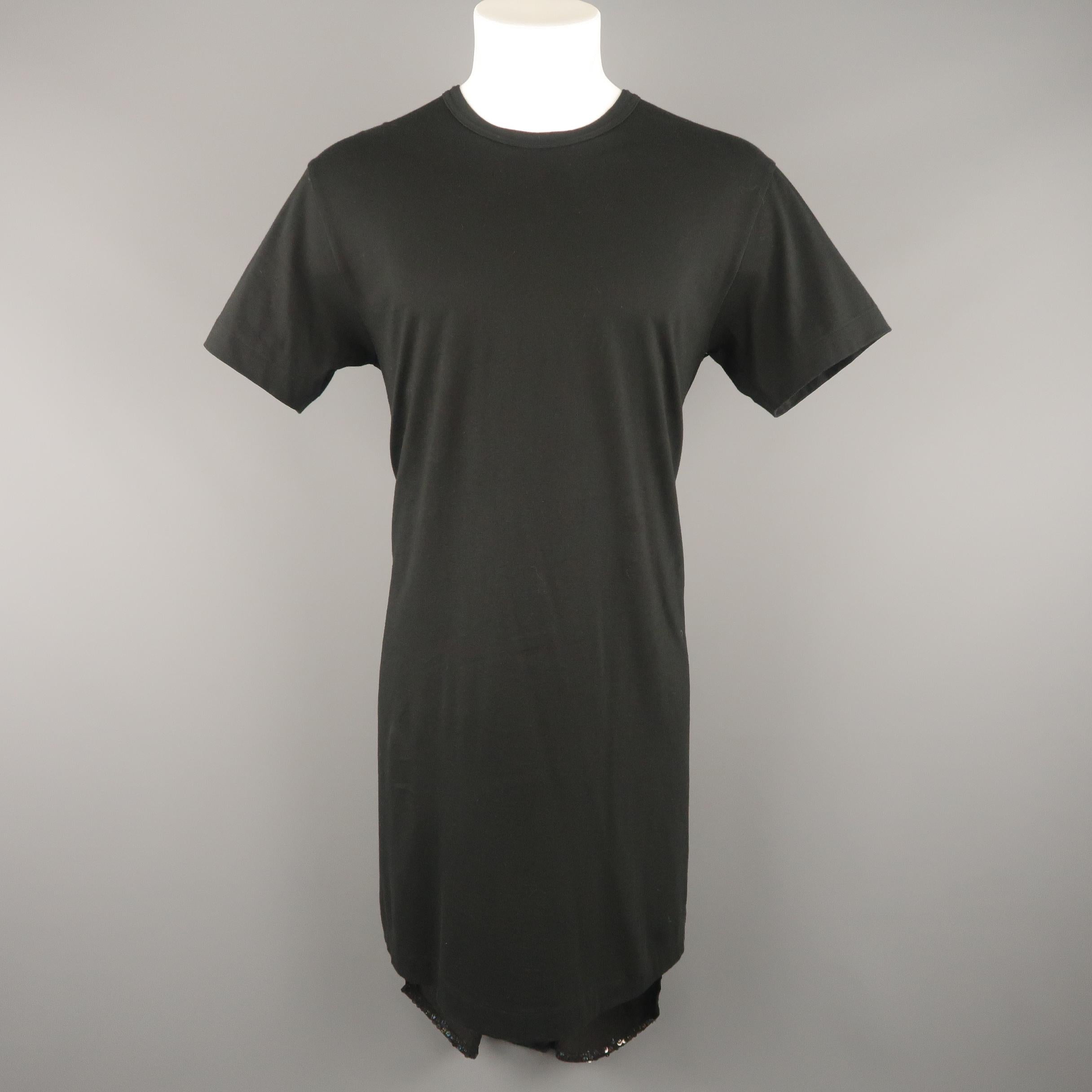 COMME des GARCONS HOMME PLUS T-shirt comes in black cotton jersey with a crewneck, long hem, and holographic sequin and velvet patchwork back. Made in Japan.
 
Excellent Pre-Owned Condition.
Marked: M
 
Measurements:
 
Shoulder: 19 in.
Chest: 41