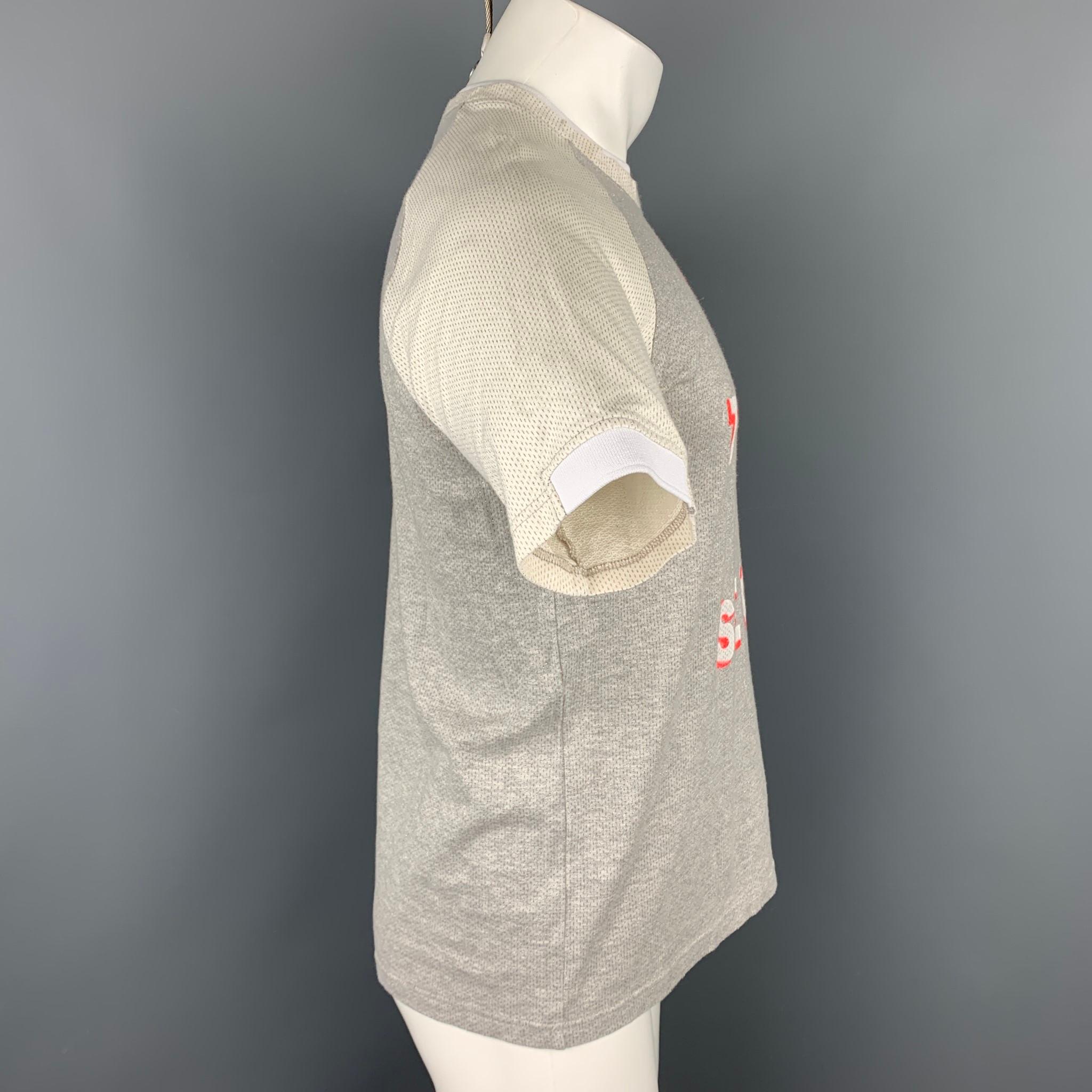COMME des GARCONS HOMME PLUS t-shirt comes in a grey & beige metallic cotton blend featuring a front 