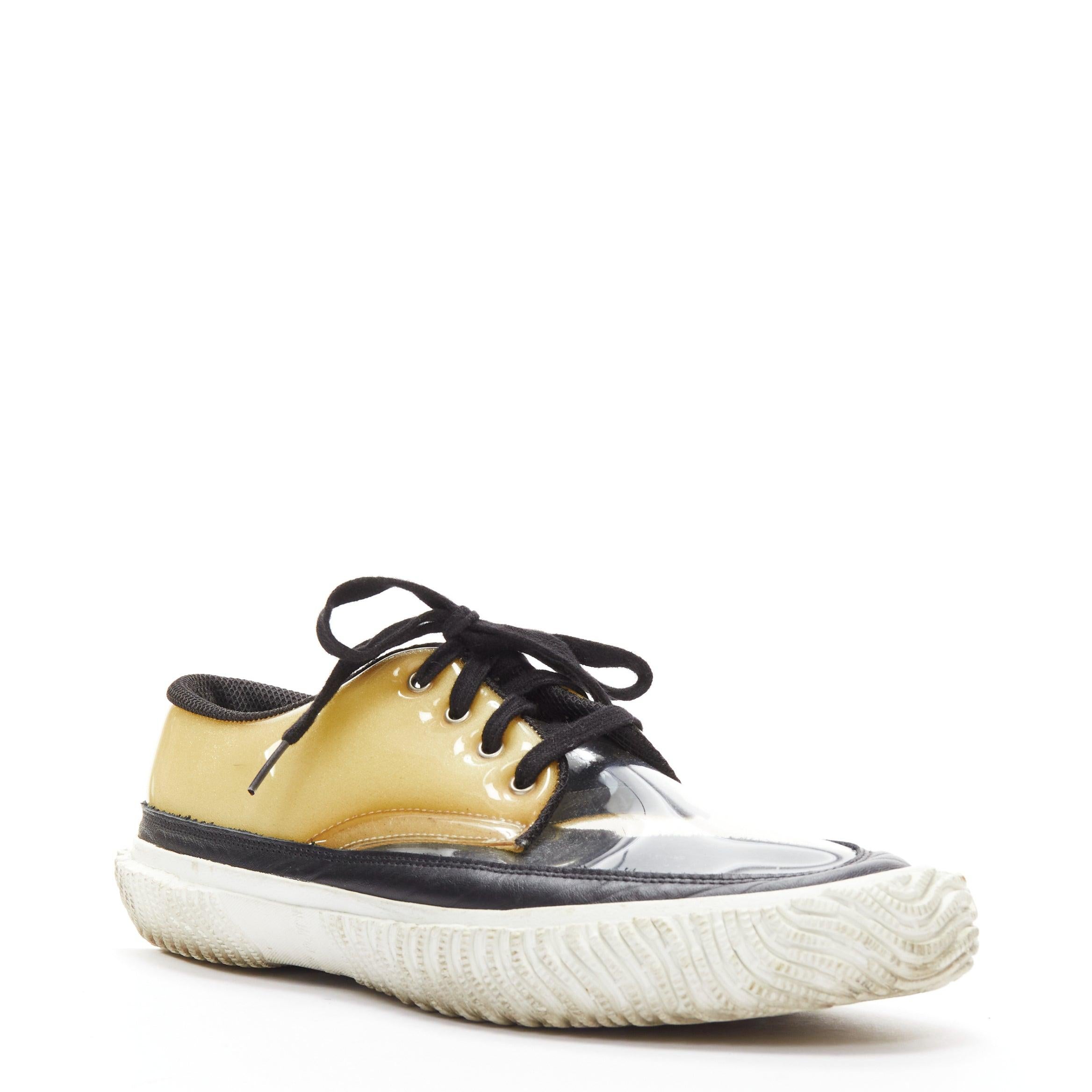 COMME DES GARCONS HOMME PLUS Switching clear beige PVC foam sneakers EU42
Reference: KNCN/A00054
Brand: Comme Des Garcons
Model: Switching
Collection: HOMME PLUS
Material: PVC, Foam, Rubber
Color: Clear, Yellow
Pattern: Solid
Closure: Lace