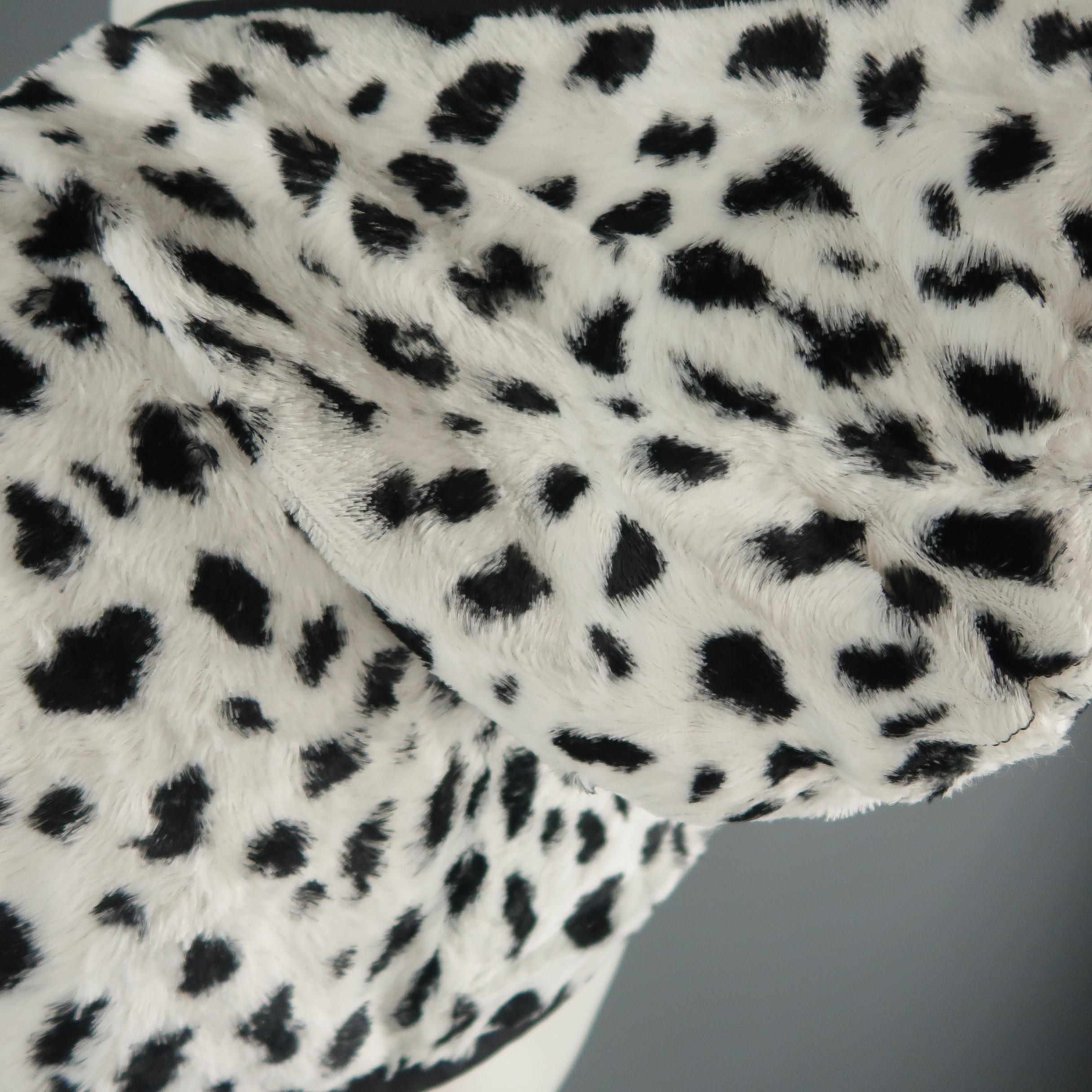 black and white spotted coat