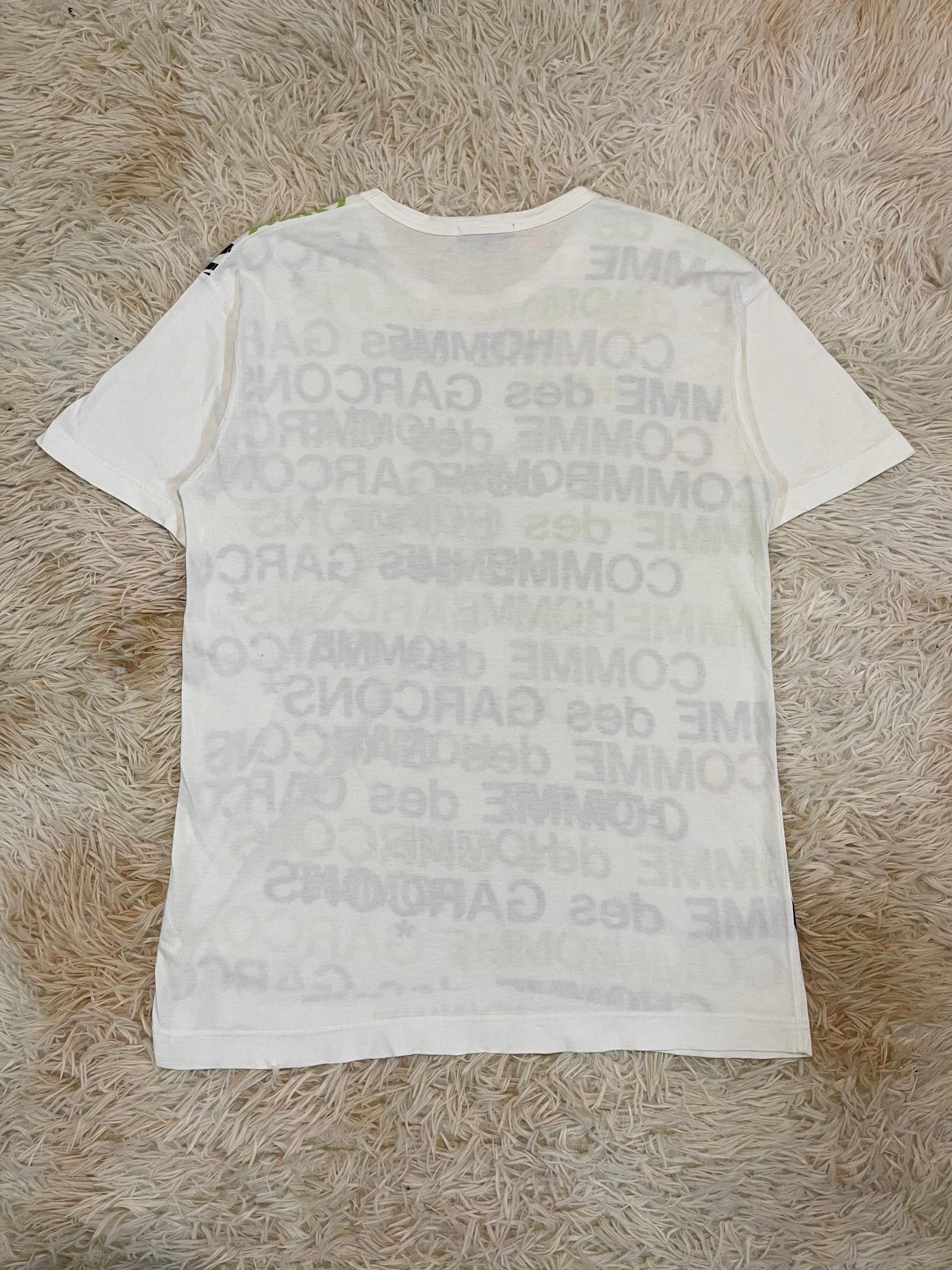 Comme Des Garcons HOMME S/S2012 - T-shirt avec texte en surimpression en vente 1