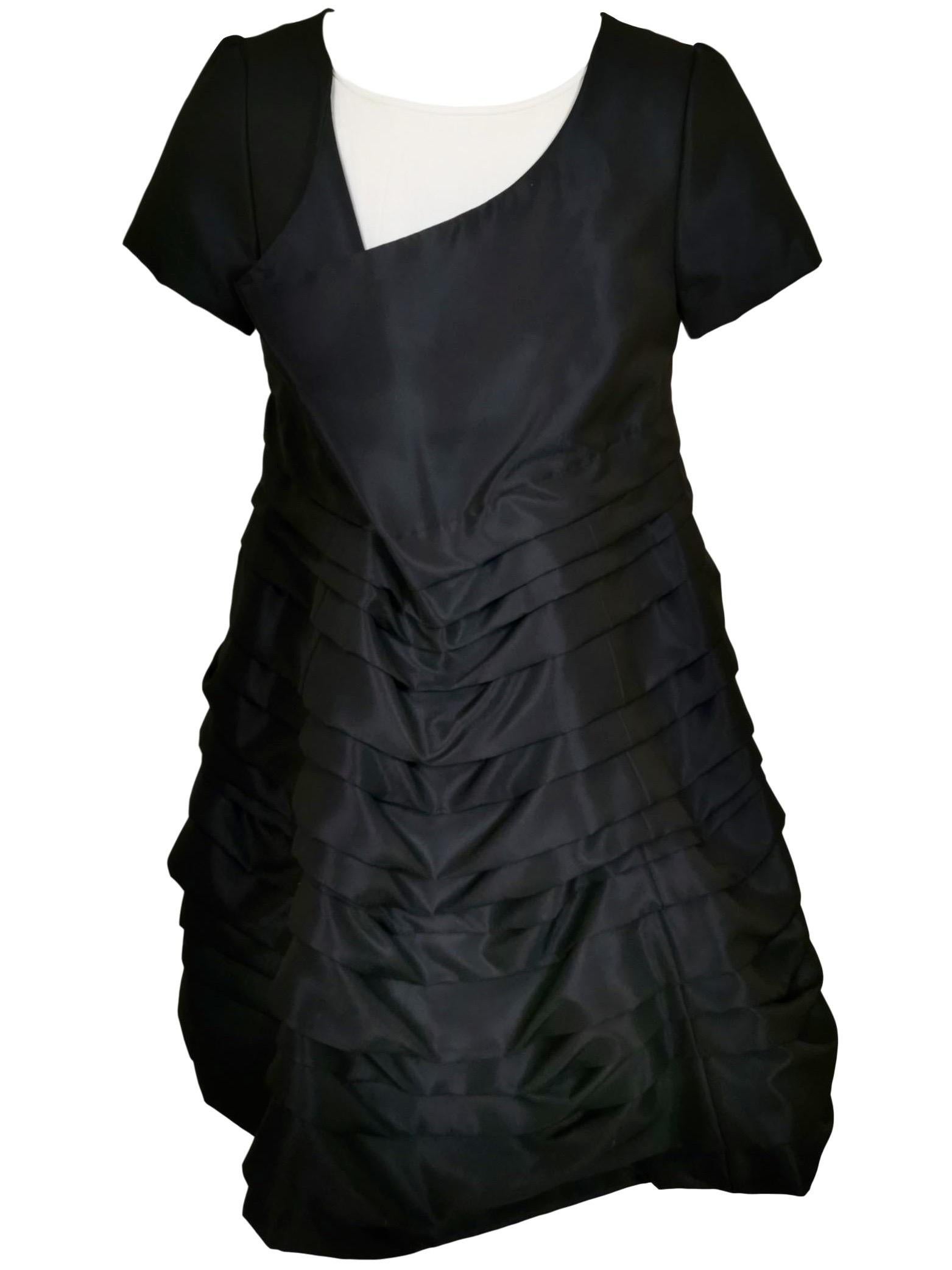 Comme des Garcons
1994 Pleated Dress with Back Flap Detail
Shown on Runway
Size M
