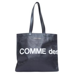 COMME DES GARCONS Shopper-Tasche aus schwarzem Kalbsleder mit großem Logo-Aufdruck