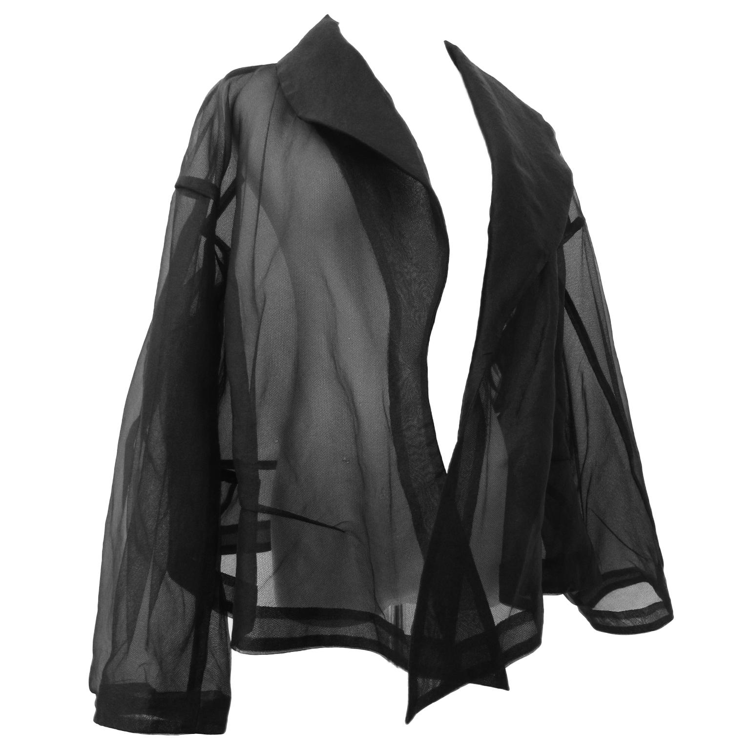 Comme des Garçons jacket from Spring-Summer 1997, body meets dress, dress meets body, referred to as the “lumps and bumps” collection.
oversized semi-sheer black jacket, tulle lining.
Polyester 100% 
Lining Nylon 100%


