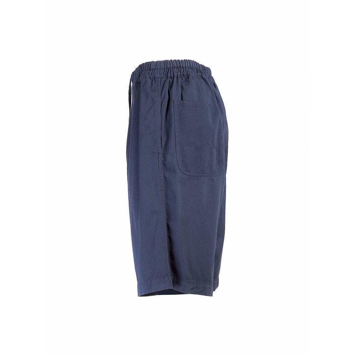 These indigo shorts offer all of the creature comforts: longer length, cotton, elasticized waist, drawstring and two oversized back pockets. What more could you ask from vintage Comme des Garçons?
