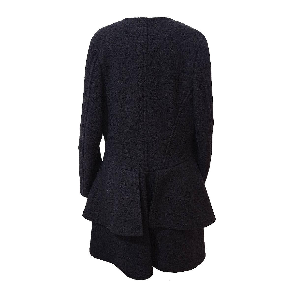 Beautiful Comme des Garçons long jacket
100% Wool 
Black color
Zip closure
Lateral cuts
Shoulder cm 42 (16,5 inches)
Shoulder / hem cm 90 (20,4 inches)
Worldwide express shipping included in the price !