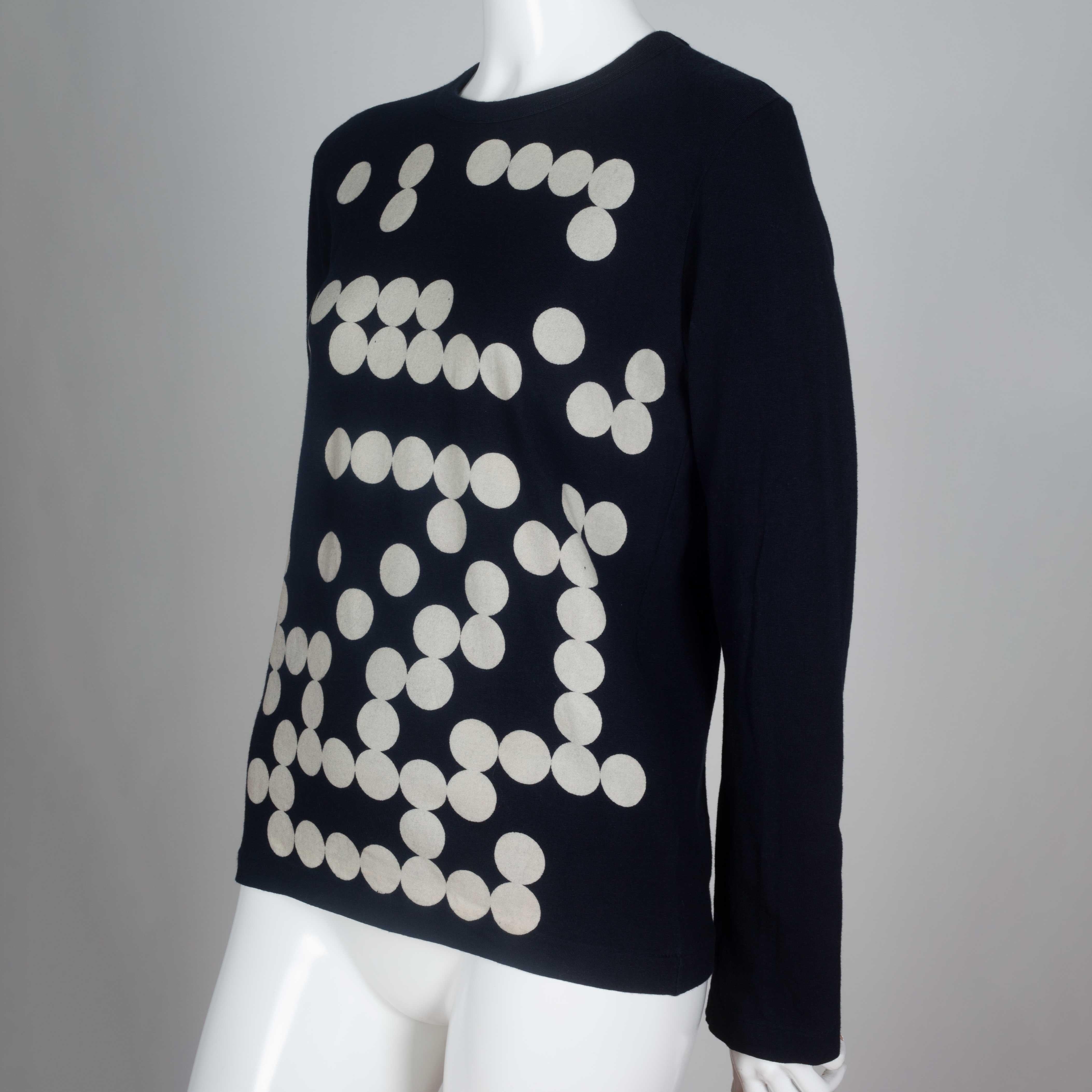 Comme des Garçons 2009 black, long sleeve t-shirt from Japan with a design of off-white dots that recall the game of Go. 

YEAR: 2009
MARKED SIZE: S
US WOMEN'S: S
US MEN'S: XS
FIT: Regular 
CHEST: 16