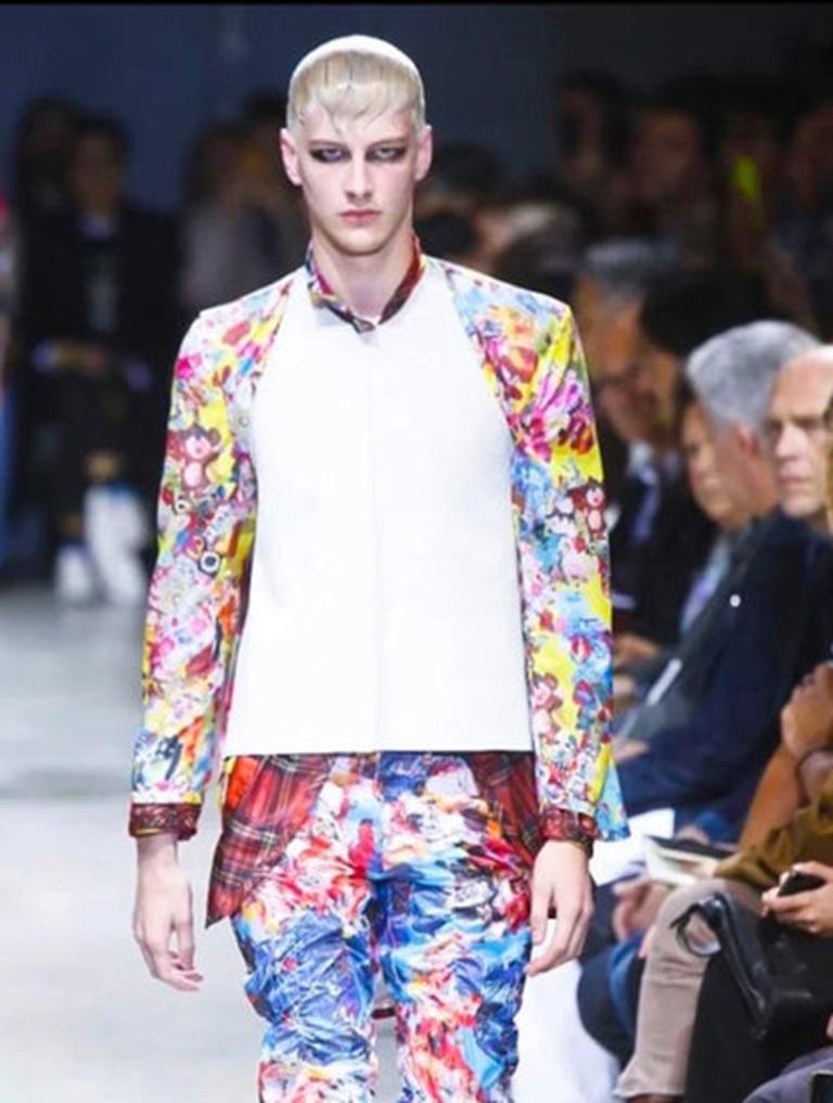 Comme Des Garçons - (Made in Japan) Triple jackets with multicolored patterns. No size indicated, it fits a size M. 2014 Spring-Summer men Collection.

Additional information:
Condition: Very good condition
Dimensions: Shoulder width: 45 cm - Chest: