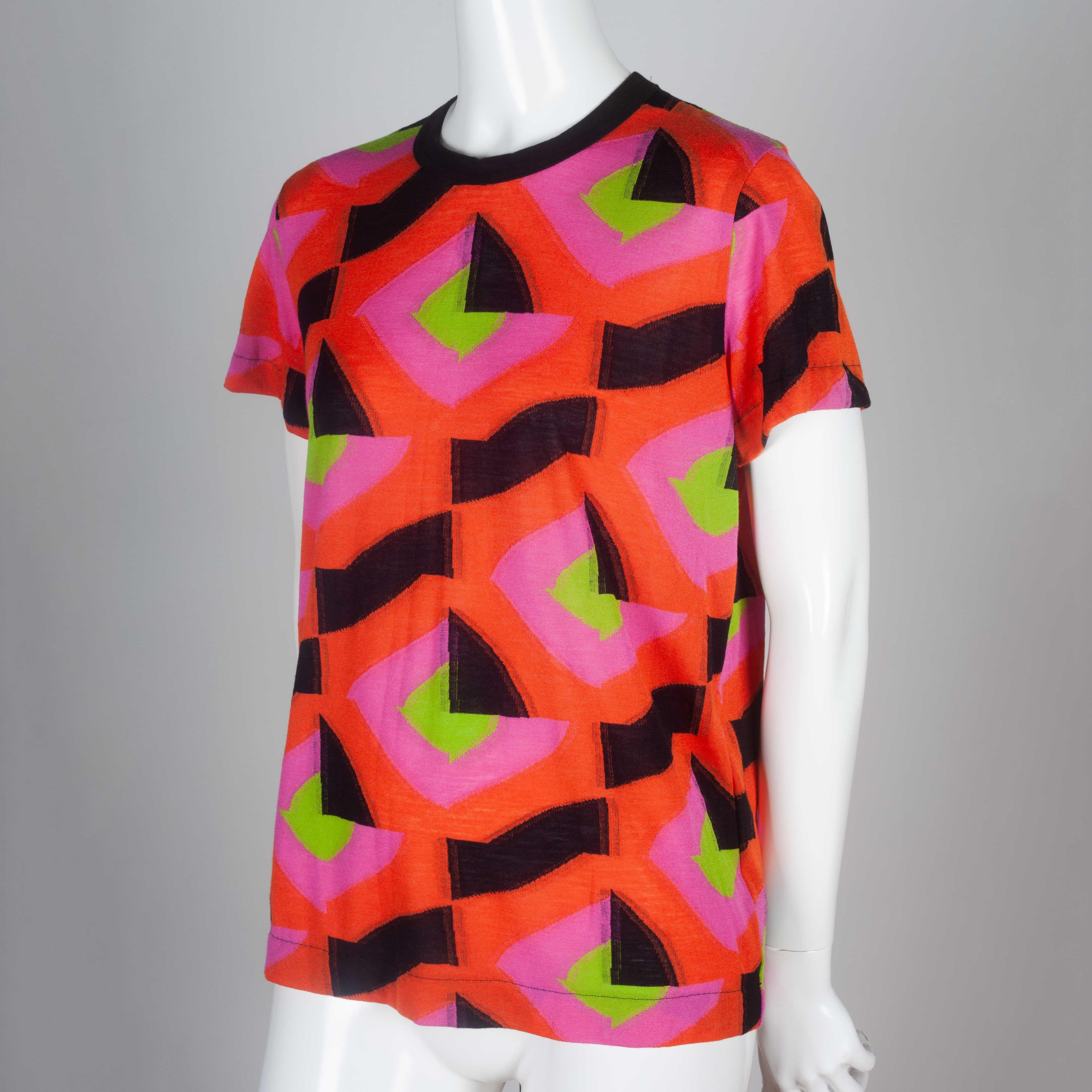 Comme des Garçons Tricot 2015 knit multi-color tee from Japan. The pop colors and geometric shapes, combined with the weaving at the outer edges of the patterns, set the mood for the internet age.

YEAR: 2015
MARKED SIZE: M
US WOMEN'S: M
US MEN'S:
