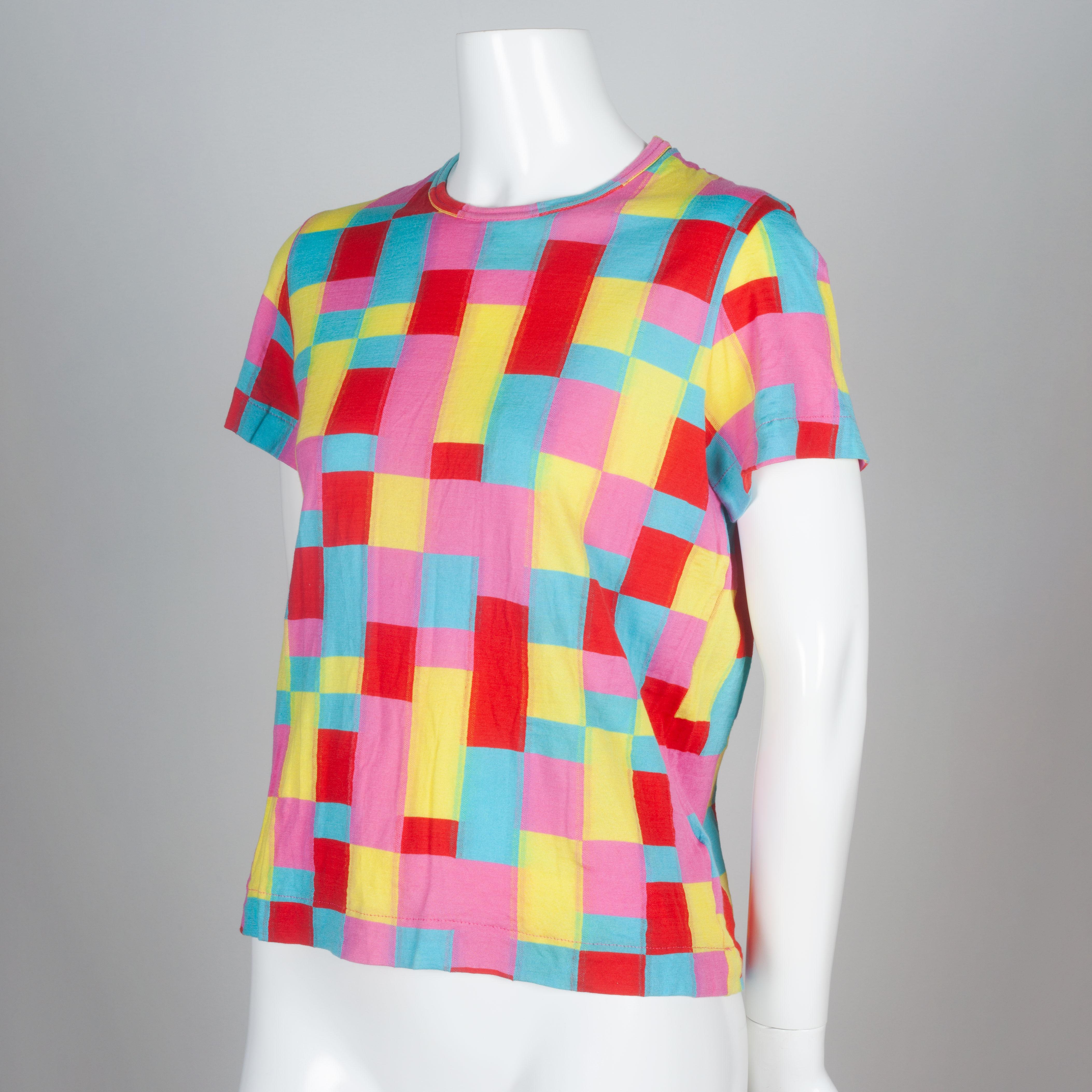 Comme des Garçons Tricot 2001 multi-color, checkered knit cotton t-shirt. Deconstructed blocks of colorful confetti motif.Pop colors and the weaving at the outer edges of the checkered patches give a glitch effect that capture the mood of the