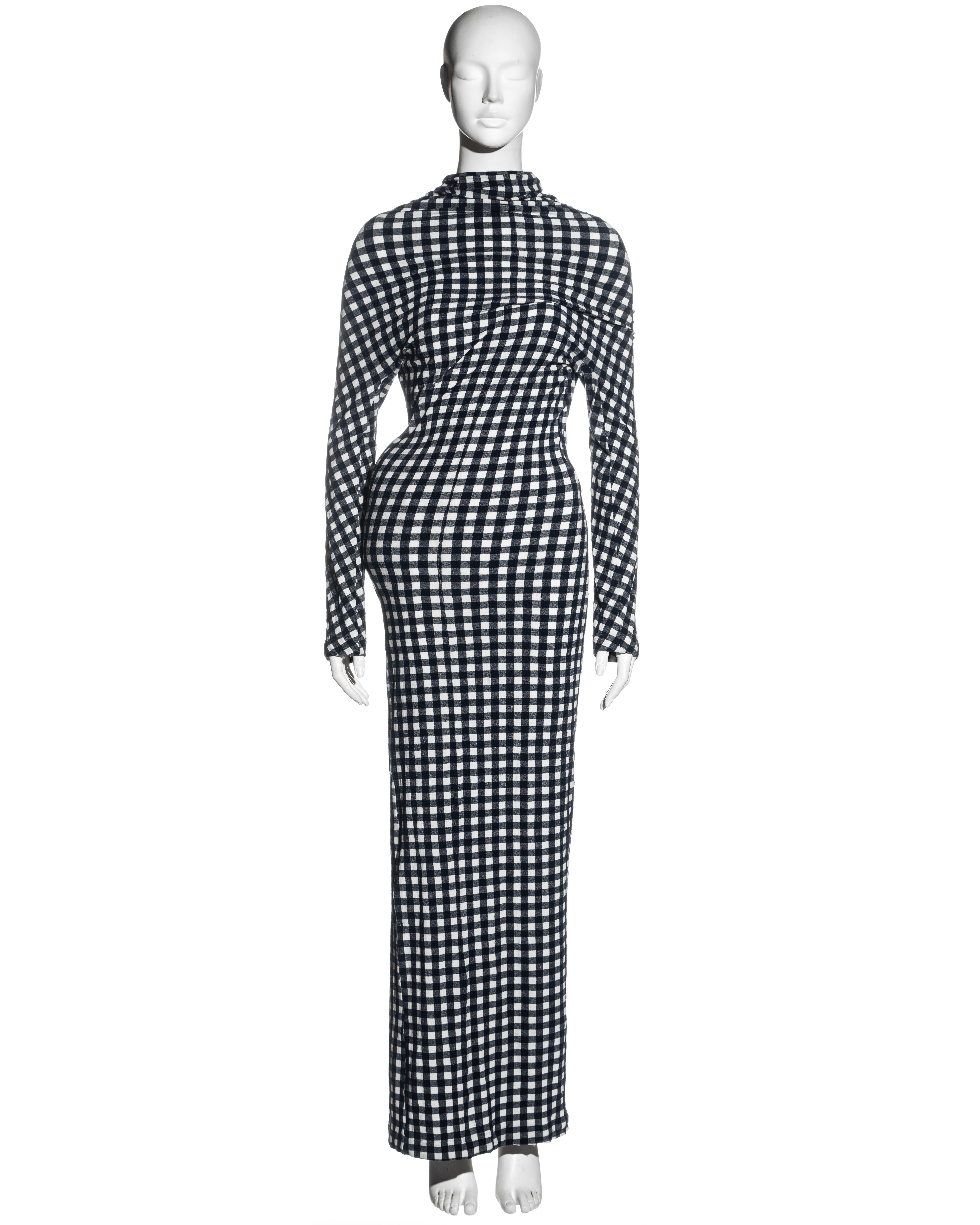 ▪ Important Comme des Garcons 'Body Meets Dress' / 'Lumps and Bumps' 2-piece showpiece ensemble
▪ Long-sleeved stretch navy and white nylon gingham maxi dress
▪ White nylon mesh underdress with down pillows positioned at the hip and upper back
▪