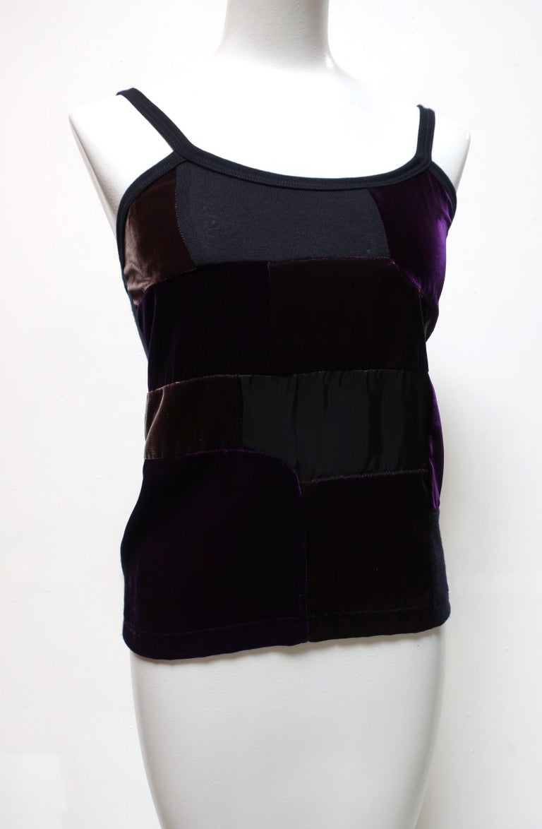 Velvety stretch wool tank from Comme Des Garçons has contrasting panels of black and purple. 