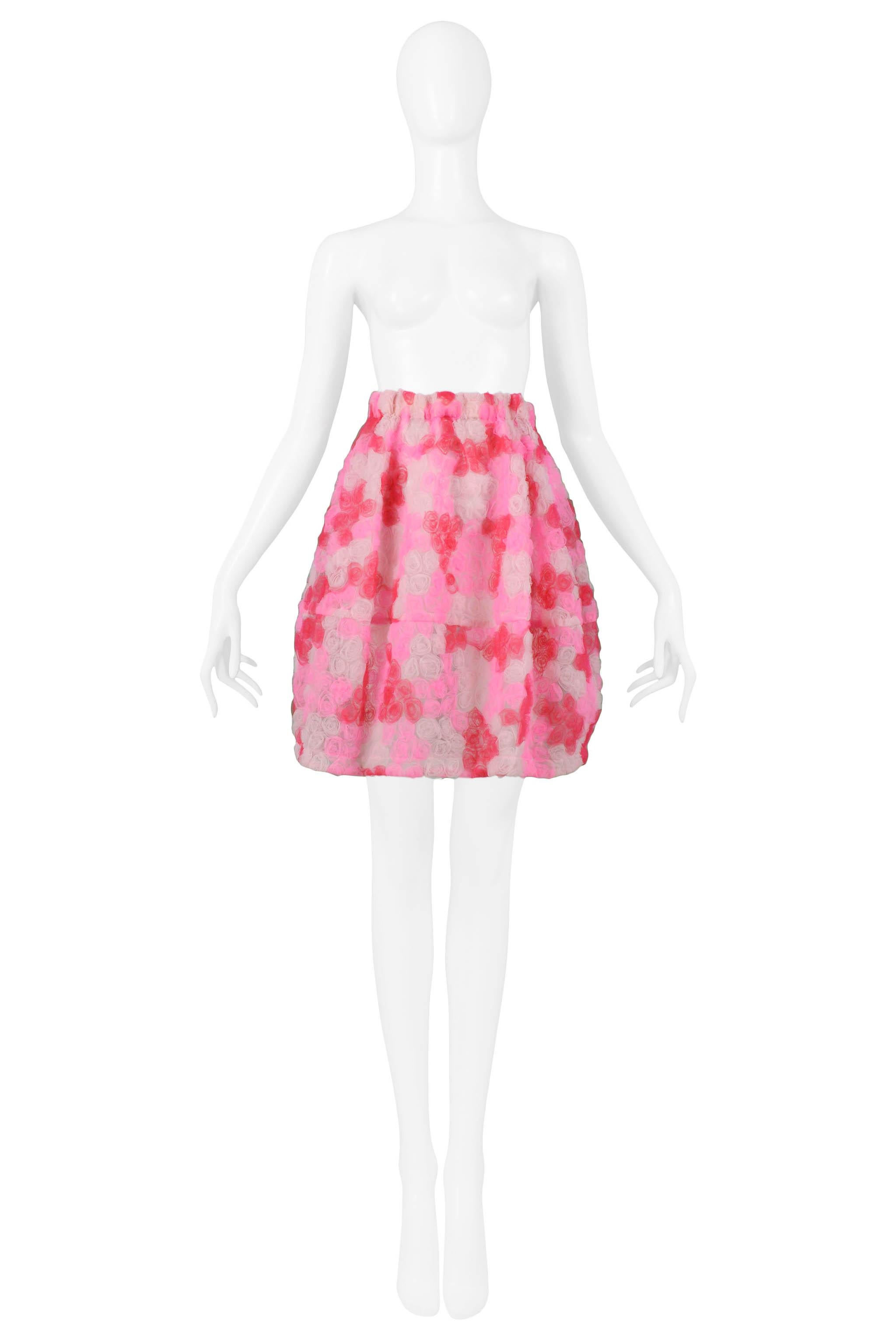 Resurrection Vintage is excited to offer a vintage Comme des Garcons multicolor pink and white tulle balloon skirt with three-dimensional rosettes. Collection 2008.

Comme Des Garcons
Size: Medium
Fabric: Tulle
2008 Collection
Excellent Vintage