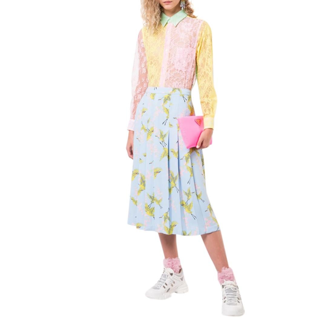 Comme des Garcons Pink Yellow & Green Lace Long Sleeve Shirt

-Made of soft lightweight lace depicting flowers 
-Gorgeous bright color combination 
-Classic elegant cut 
-Button fastening to the front 
-Pleat detail to the back 
-Buttoned cuffs