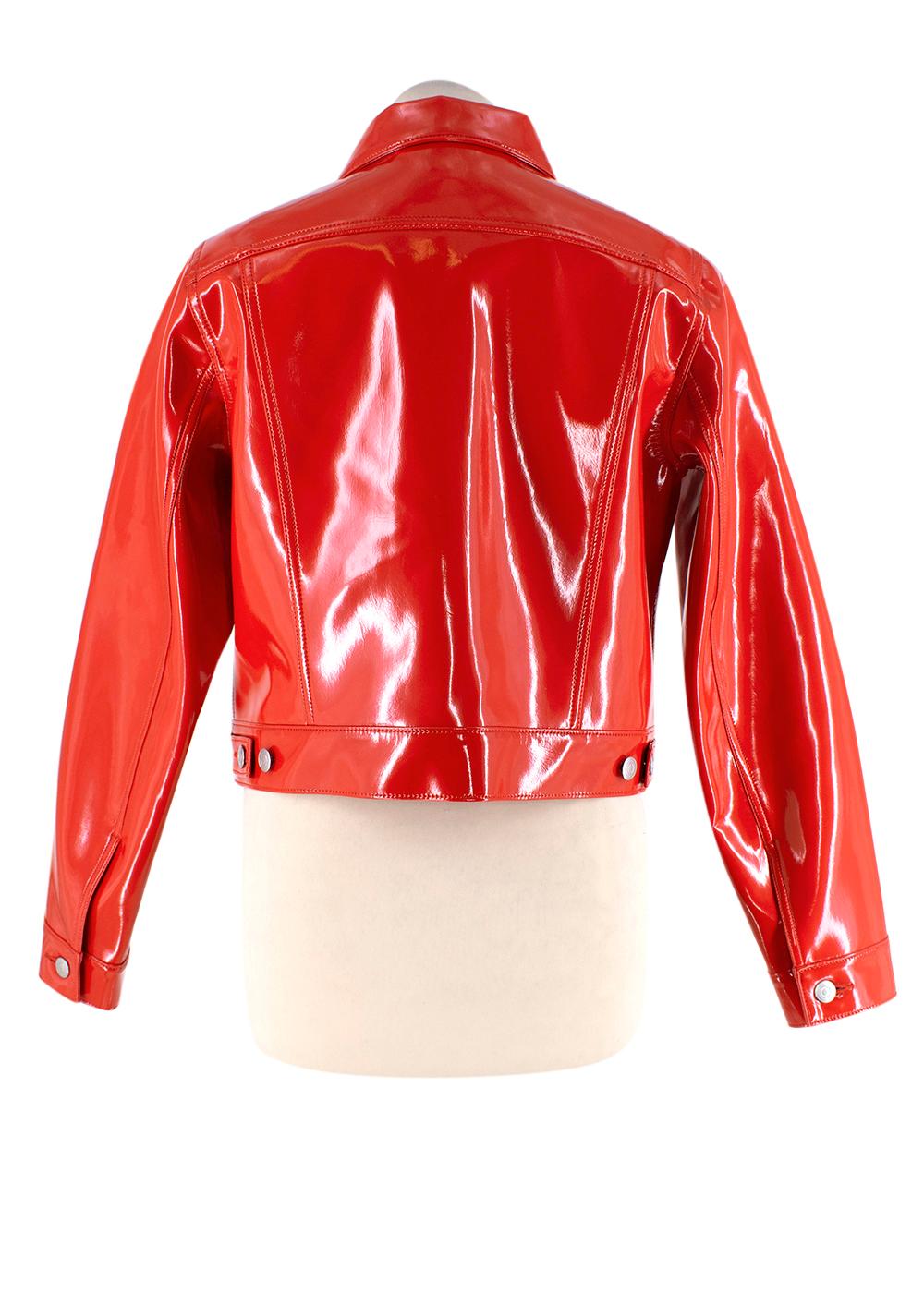 Comme des Garcons Red Vinyl Cropped Jacket

- Cropped, button through jacket in vivid red, high shine vinyl
- Point collar, patch pockets, long sleeve 
- Decorative topstitching
- Boxy cut

Materials 
100% Polyurethane 
85% Nylon
15% Polyurethane